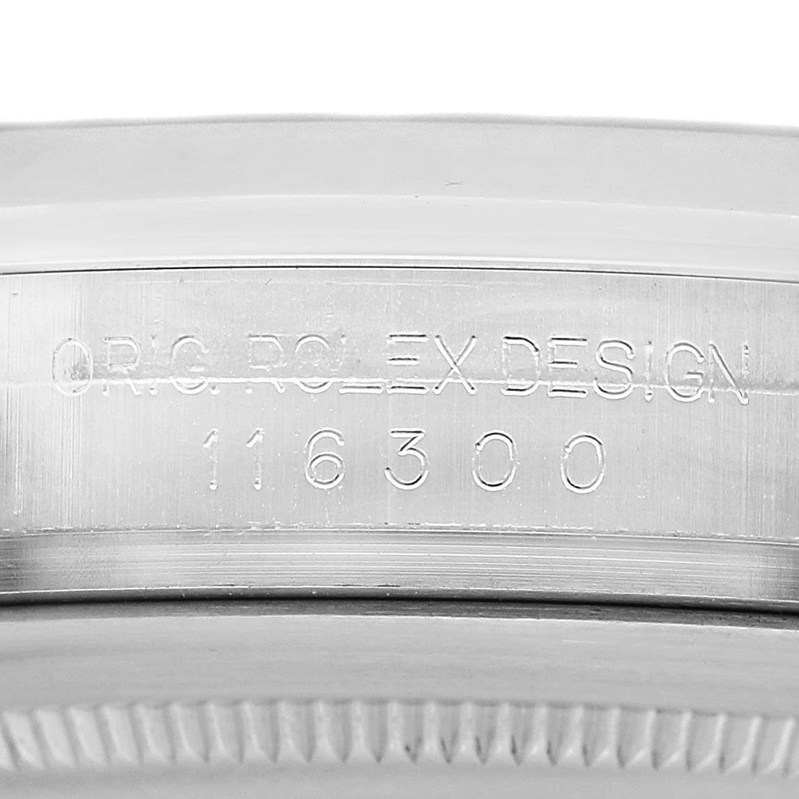 The image shows a close-up of the engraving on the side of the Rolex Datejust 41 116300 Men's Stainless Steel Silver Dial case, featuring the design and model number.