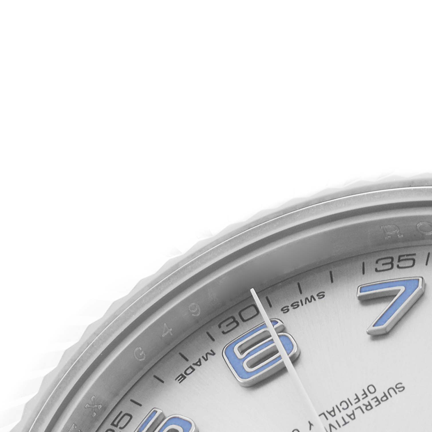 The image shows a close-up of the dial and partial bezel of a Rolex Datejust 41 116334 Men's Stainless Steel Silver Dial, highlighting the hour markers and minute hand.