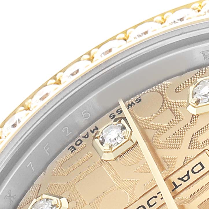 The image shows a close-up of the Rolex Datejust 178383 Women's Steel and Gold (two tone) Champagne Dial's dial with diamond hour markers and part of the bezel.