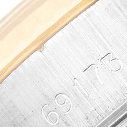 The image shows a close-up of the brushed metal surface and edge of a Rolex Datejust 69173 Women's Steel and Gold (two tone) Black Dial 69173 Women's Steel and Gold (two tone) Black Dial model, featuring the model number "69173."