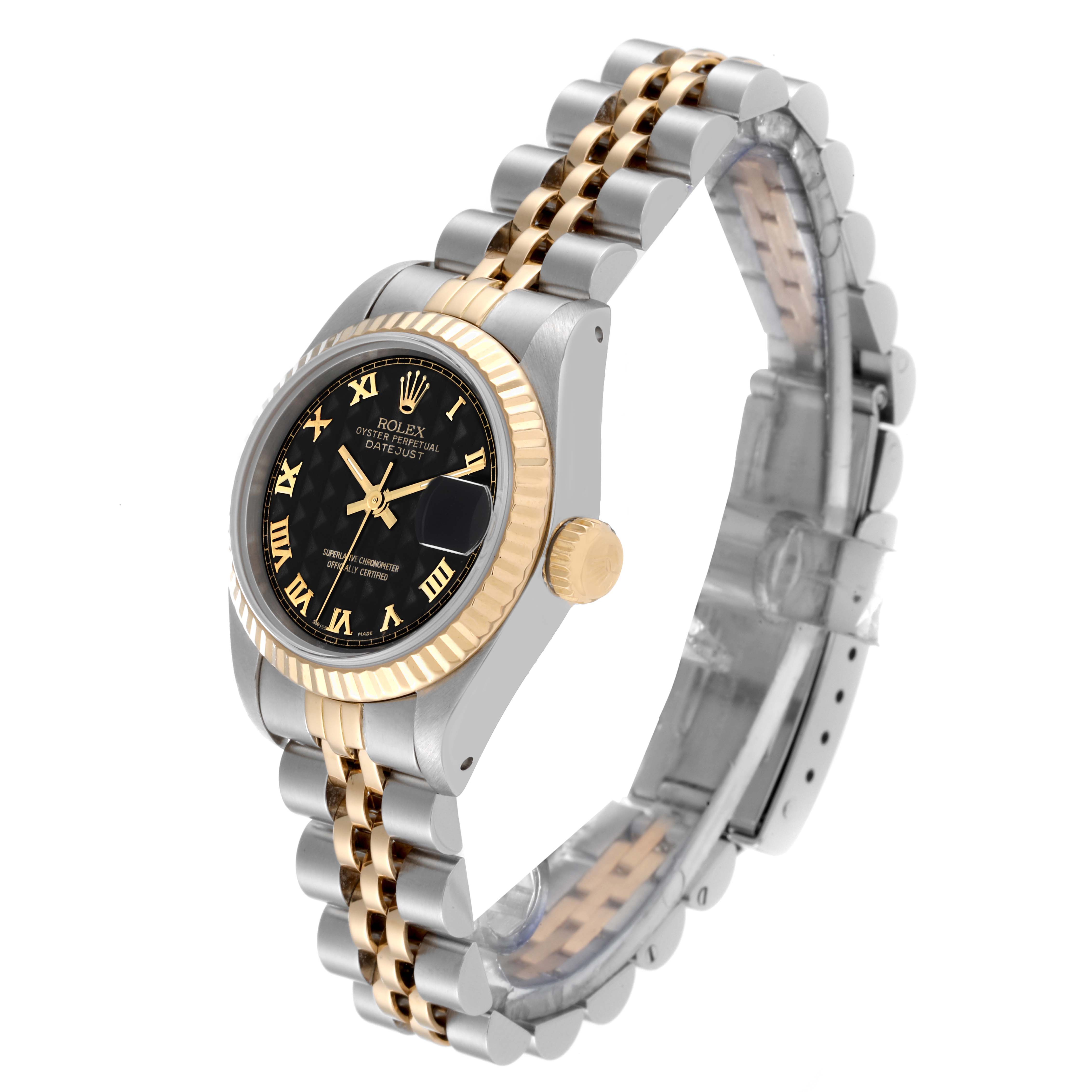 This image shows a Rolex Datejust 69173 Women's Steel and Gold (two tone) Black Dial 69173 Women's Steel and Gold (two tone) Black Dial watch at an oblique angle, highlighting its two-tone bracelet, black dial, and gold fluted bezel.