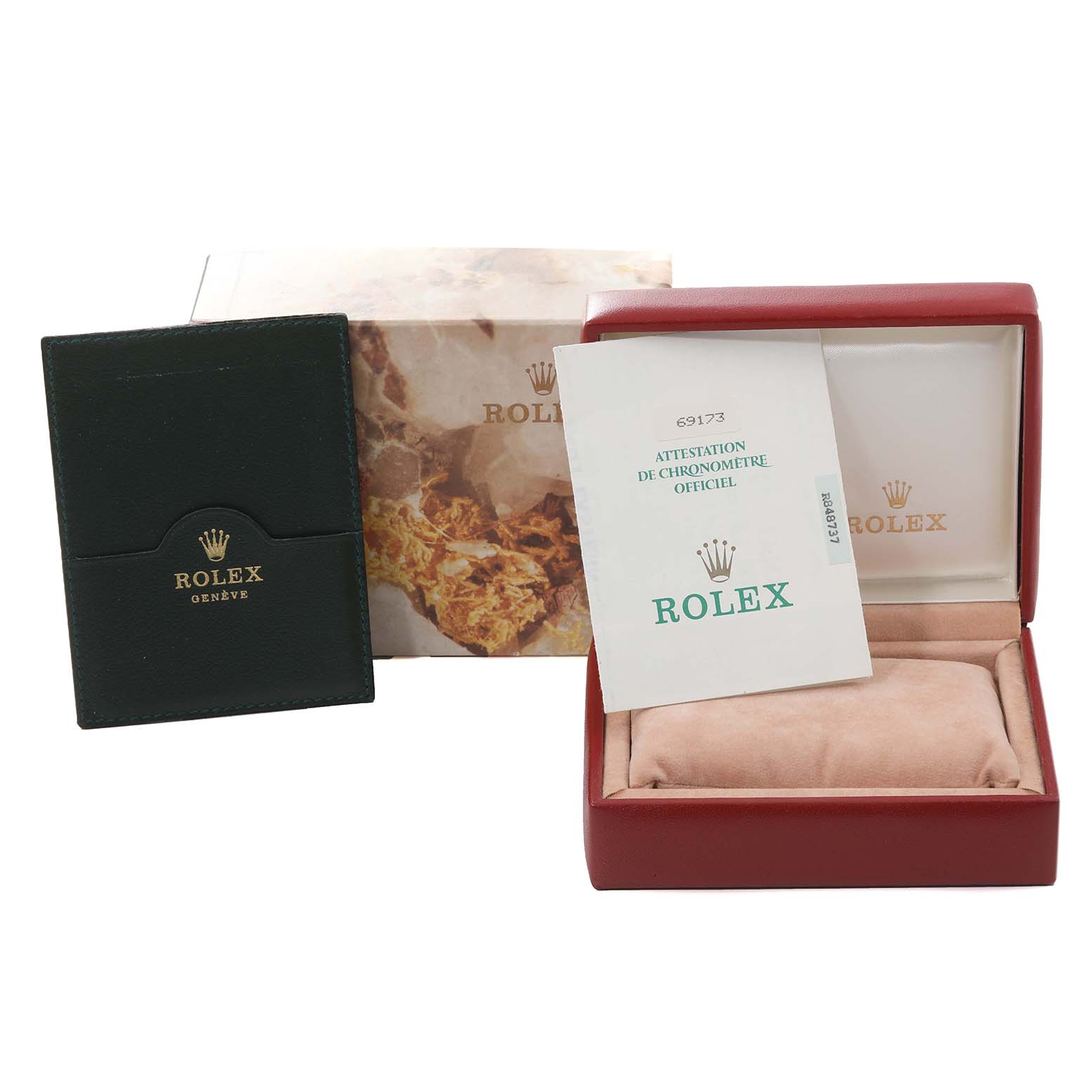 This image shows the packaging, certificate, and storage box for a Rolex Datejust 69173 Women's Steel and Gold (two tone) Black Dial 69173 Women's Steel and Gold (two tone) Black Dial watch.