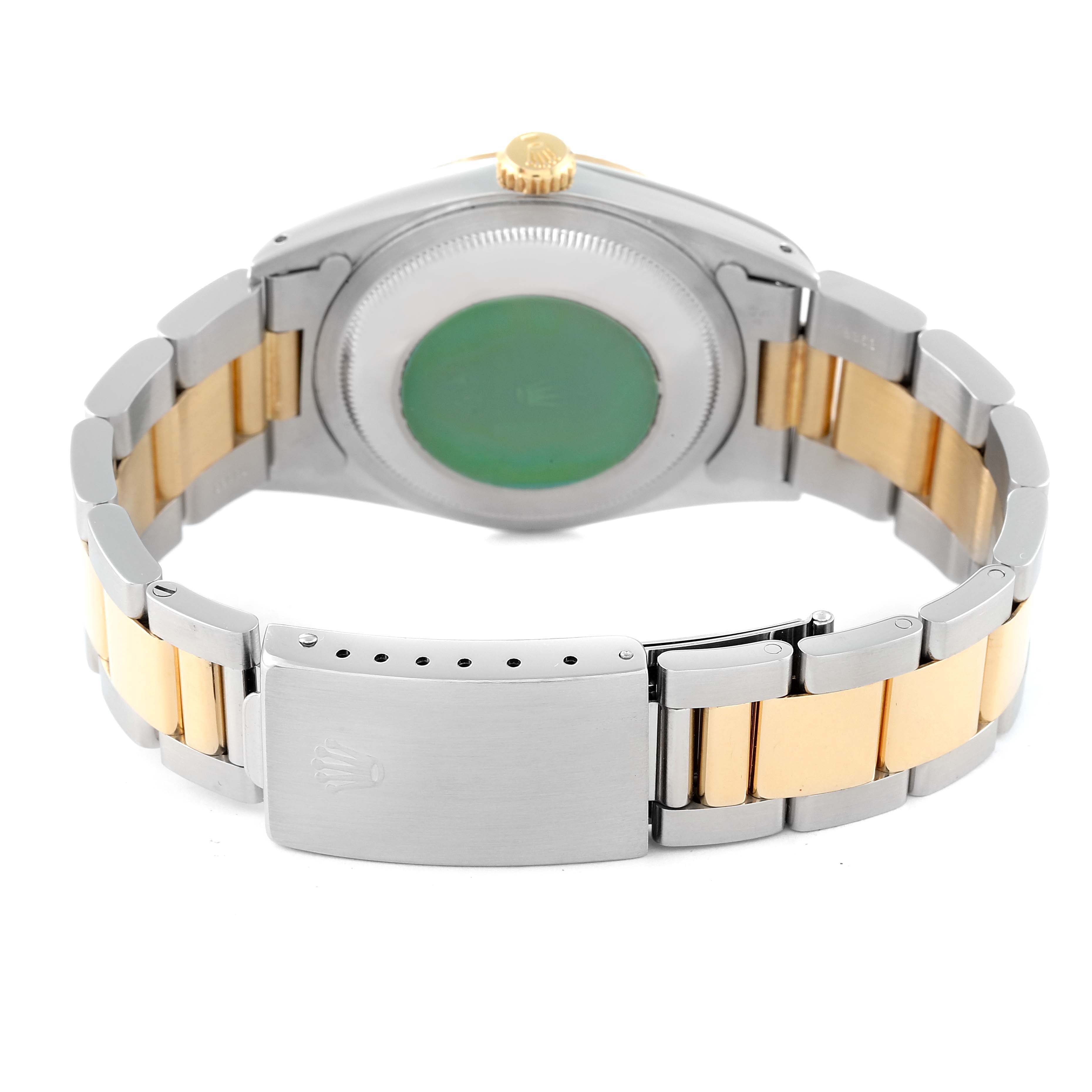 This image shows the back casing and bracelet clasp of a Rolex Datejust 16233 Men's Steel and Gold (two tone) Champagne Dial 16233 Men's Steel and Gold (two tone) Champagne Dial model watch from a rear angle.