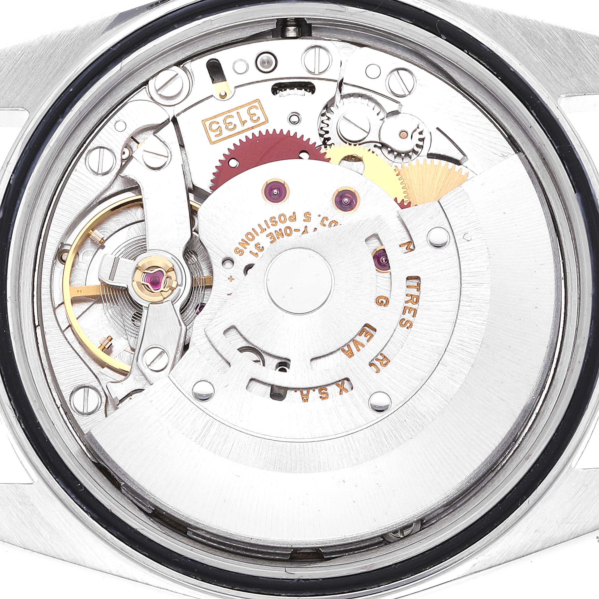 This image shows the internals of the Rolex Datejust 16233 Men's Steel and Gold (two tone) Champagne Dial 16233 Men's Steel and Gold (two tone) Champagne Dial watch, focusing on the movement and mechanical parts from a back angle.