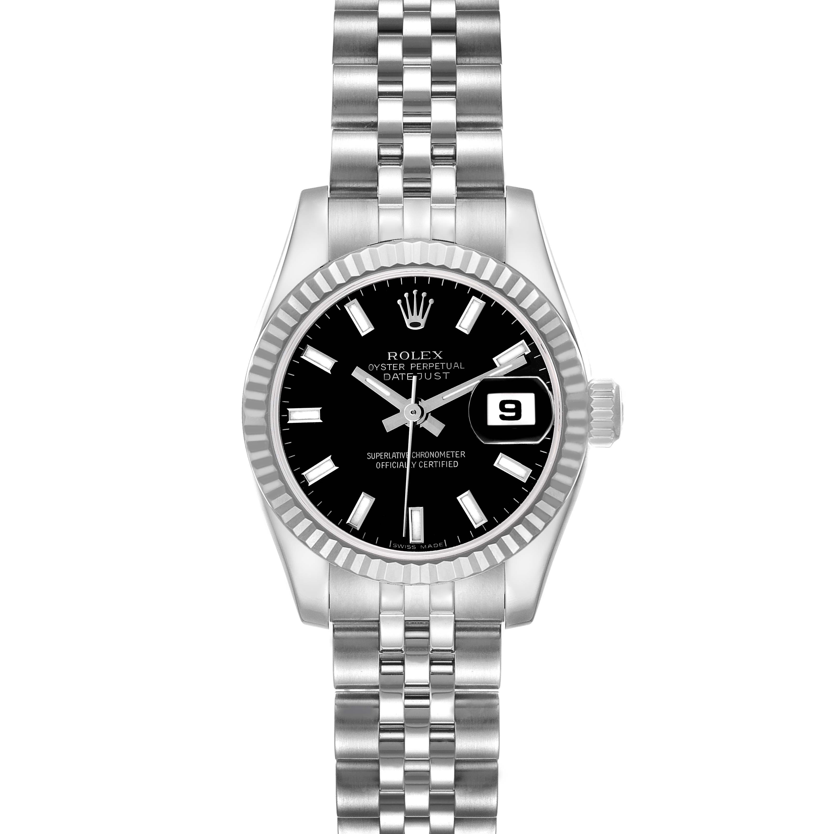 The Rolex Datejust 179174 Women's Stainless Steel Black Dial watch is shown from the front, displaying its black dial, fluted bezel, stainless steel bracelet, and date window.