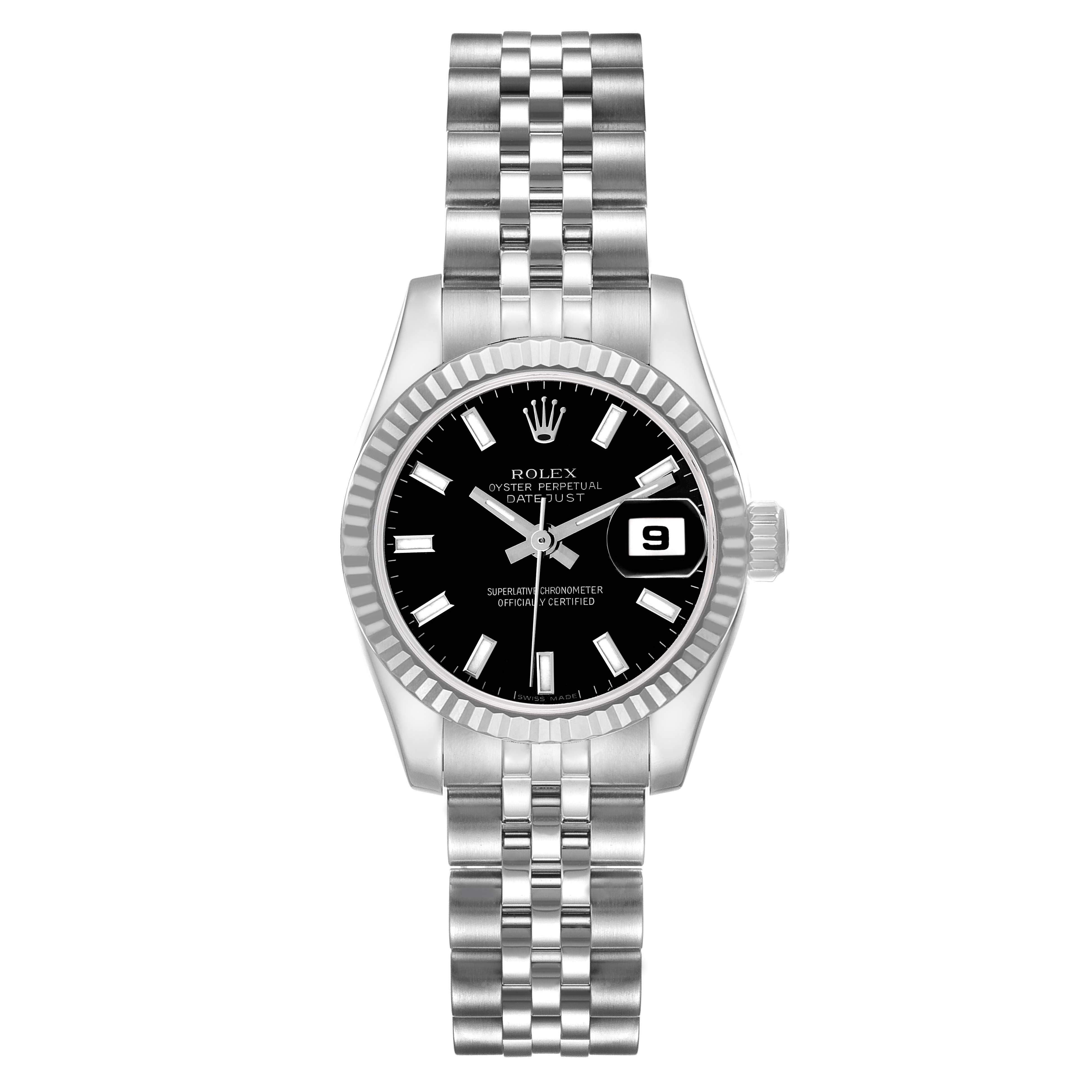 The image shows a front view of a Rolex Datejust 179174 Women's Stainless Steel Black Dial, highlighting its black dial, fluted bezel, and Jubilee bracelet.