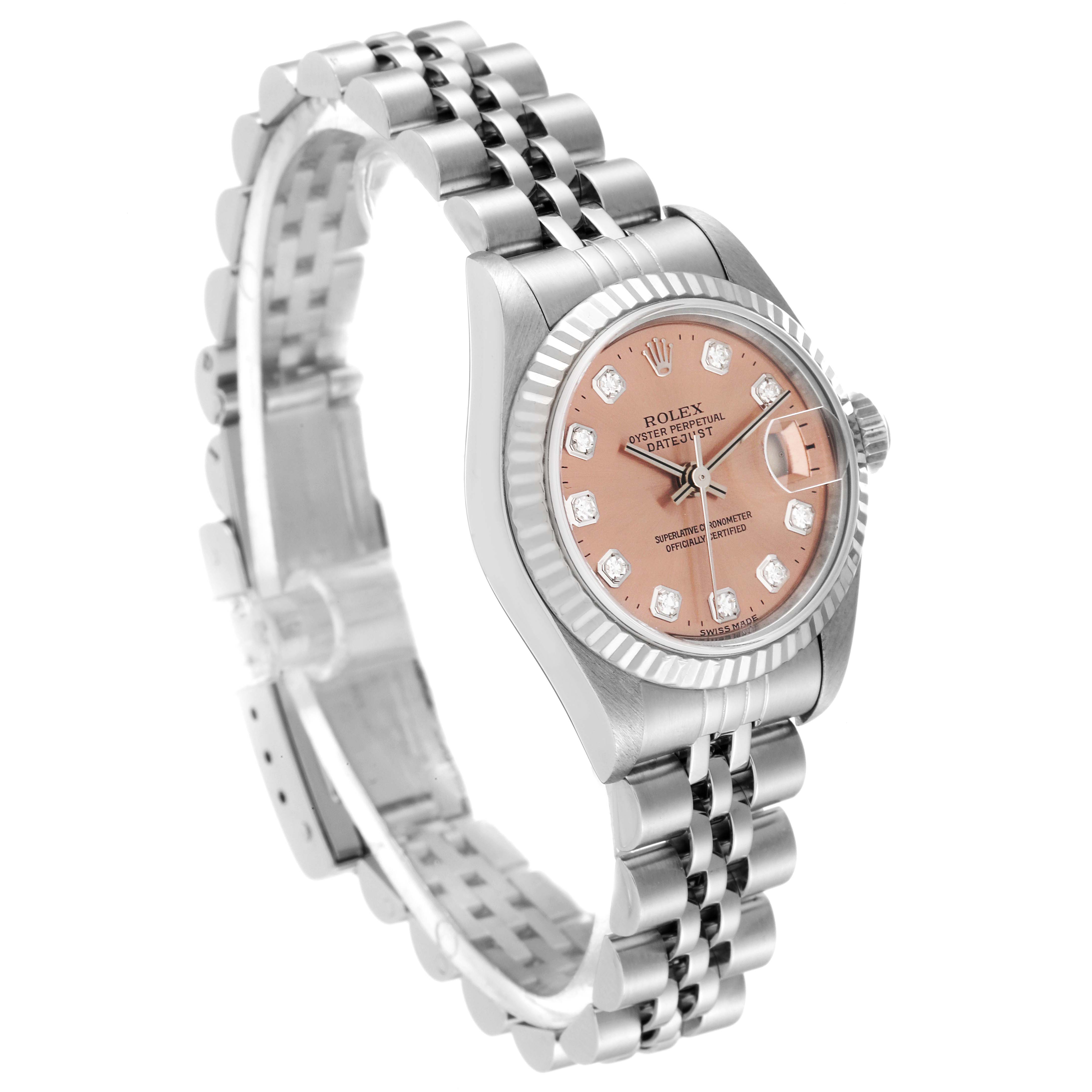 The image shows a side angle of a Rolex Datejust 79174 Women's Stainless Steel Pink Dial 79174 Women's Stainless Steel Pink Dial watch, highlighting the dial, bezel, and stainless steel bracelet.