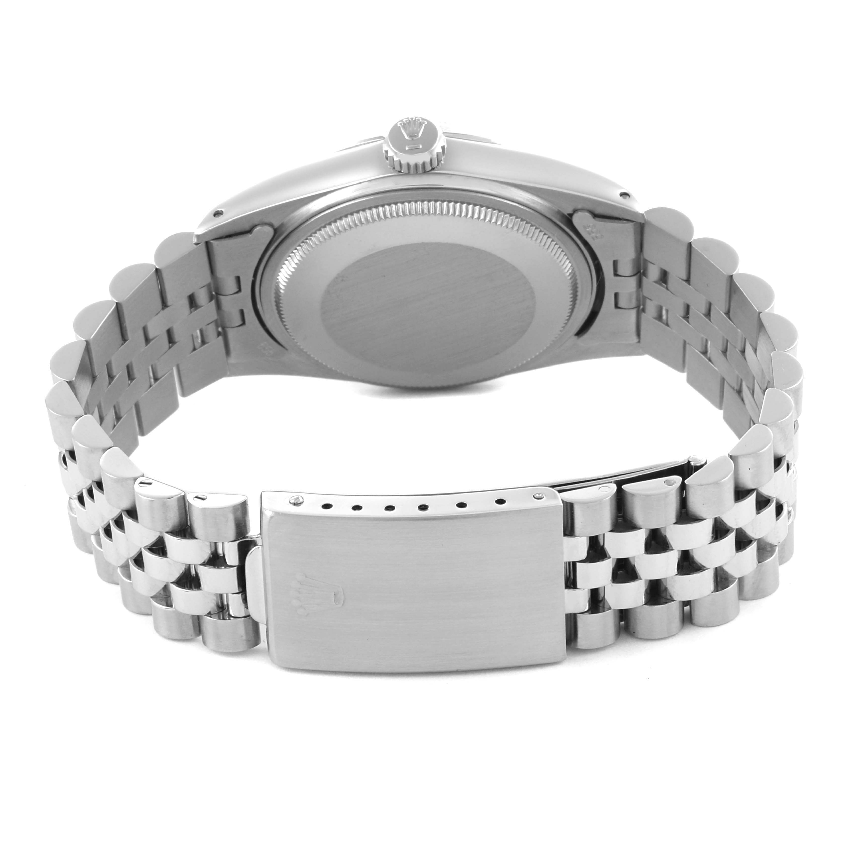 This image shows the back case and bracelet clasp of a Rolex Datejust 16014 Men's Stainless Steel Silver Dial 16014 Men's Stainless Steel Silver Dial watch.
