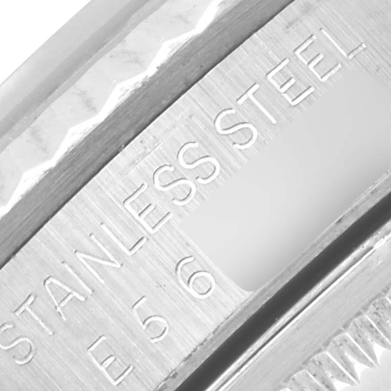 This close-up image shows the engraved details on the stainless steel case of a Rolex Datejust 16234 Men's Stainless Steel Silver Dial 16234 Men's Stainless Steel Silver Dial watch.