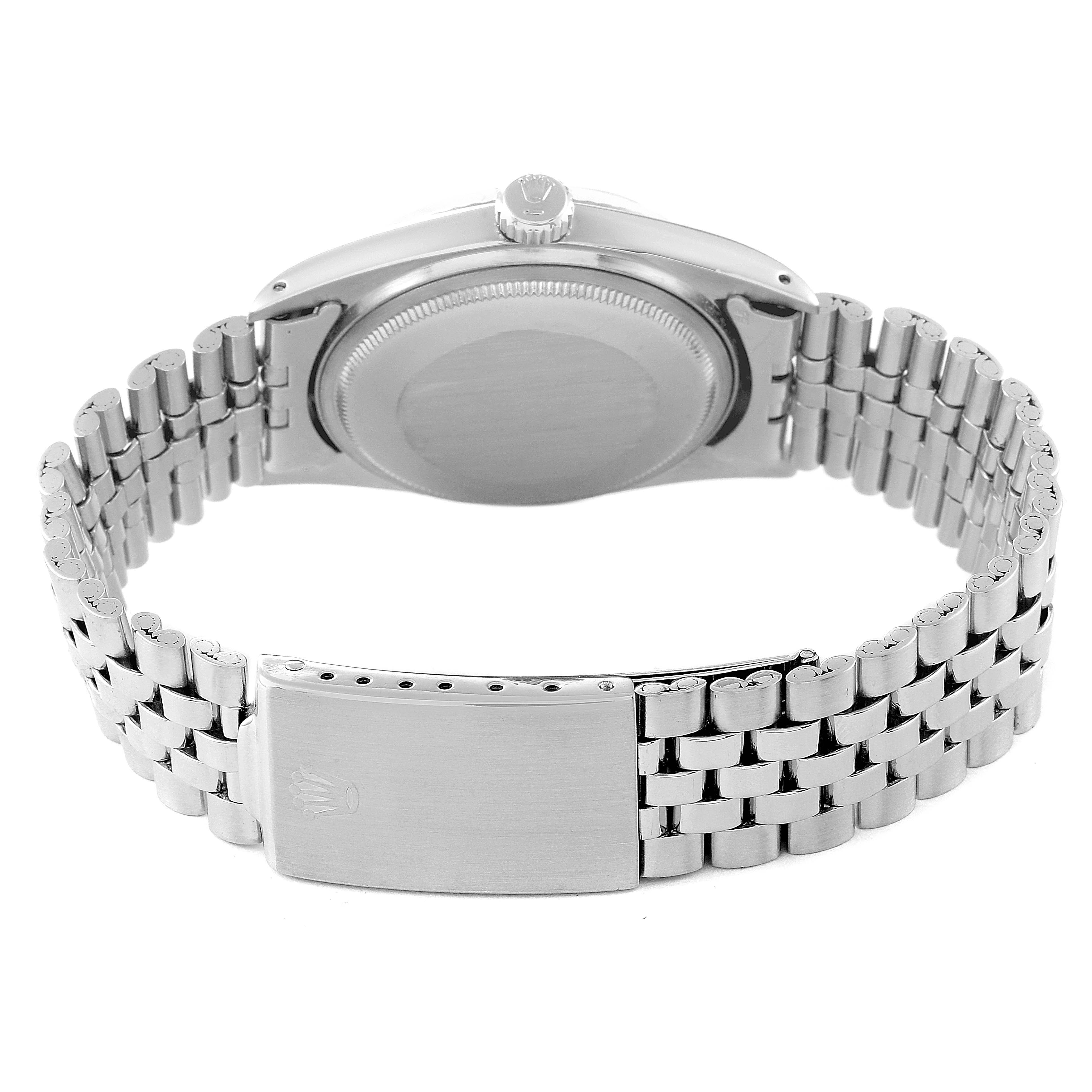 This image shows the back view of a Rolex Vintage Collection 1601 Men
s Stainless Steel Silver Dial 1601 Men
s Stainless Steel Silver Dial watch, displaying the case back and bracelet with the clasp.