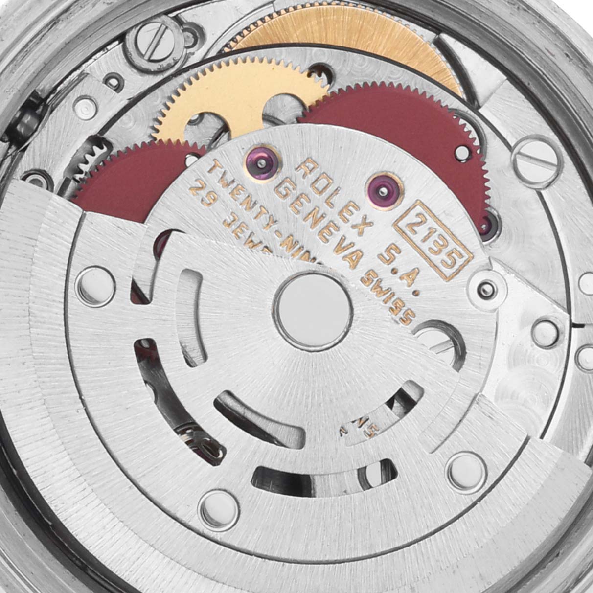 The image shows the intricate internal mechanics of a Rolex Datejust 69173 Women's Steel and Gold (two tone) Black Dial 69173 Women's Steel and Gold (two tone) Black Dial watch at a close-up angle.