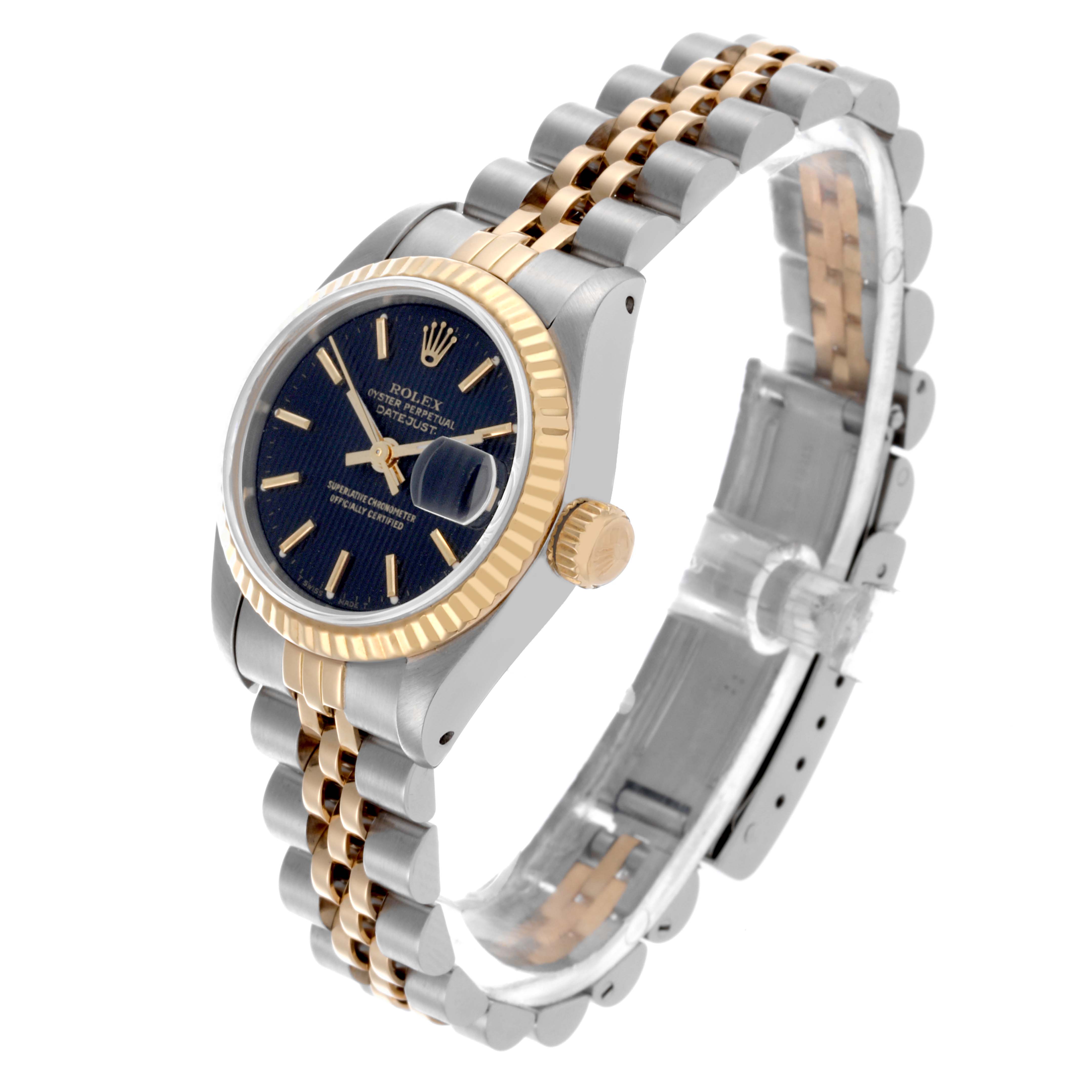 The Rolex Datejust 69173 Women's Steel and Gold (two tone) Black Dial 69173 Women's Steel and Gold (two tone) Black Dial watch is shown at an oblique angle, displaying the face, bezel, crown, and partial bracelet.