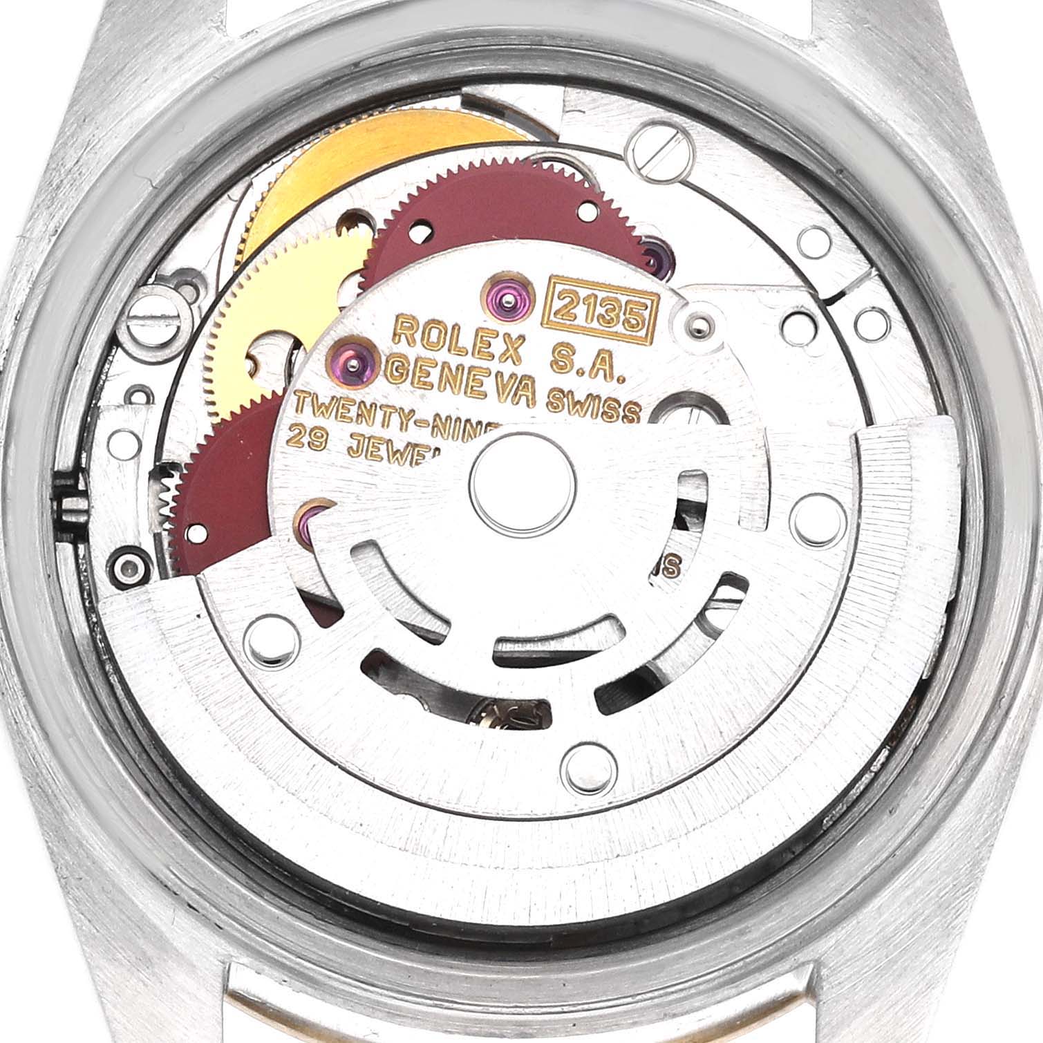 The image shows the movement of a Rolex Datejust 69173 Women's Steel and Gold (two tone) Champagne Dial 69173 Women's Steel and Gold (two tone) Champagne Dial watch from the back, highlighting gears and mechanism details.