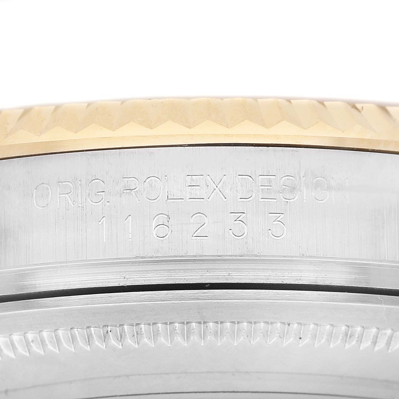 The image shows a close-up of the side of a Rolex Datejust 116233 Men's Stainless Steel Silver Dial, highlighting the model number and fluted bezel.