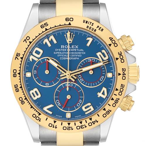 The Rolex Daytona 116503 Men's Steel and Gold (two tone) Blue Dial watch is shown from a front angle, highlighting the bezel, dial, and pushers.