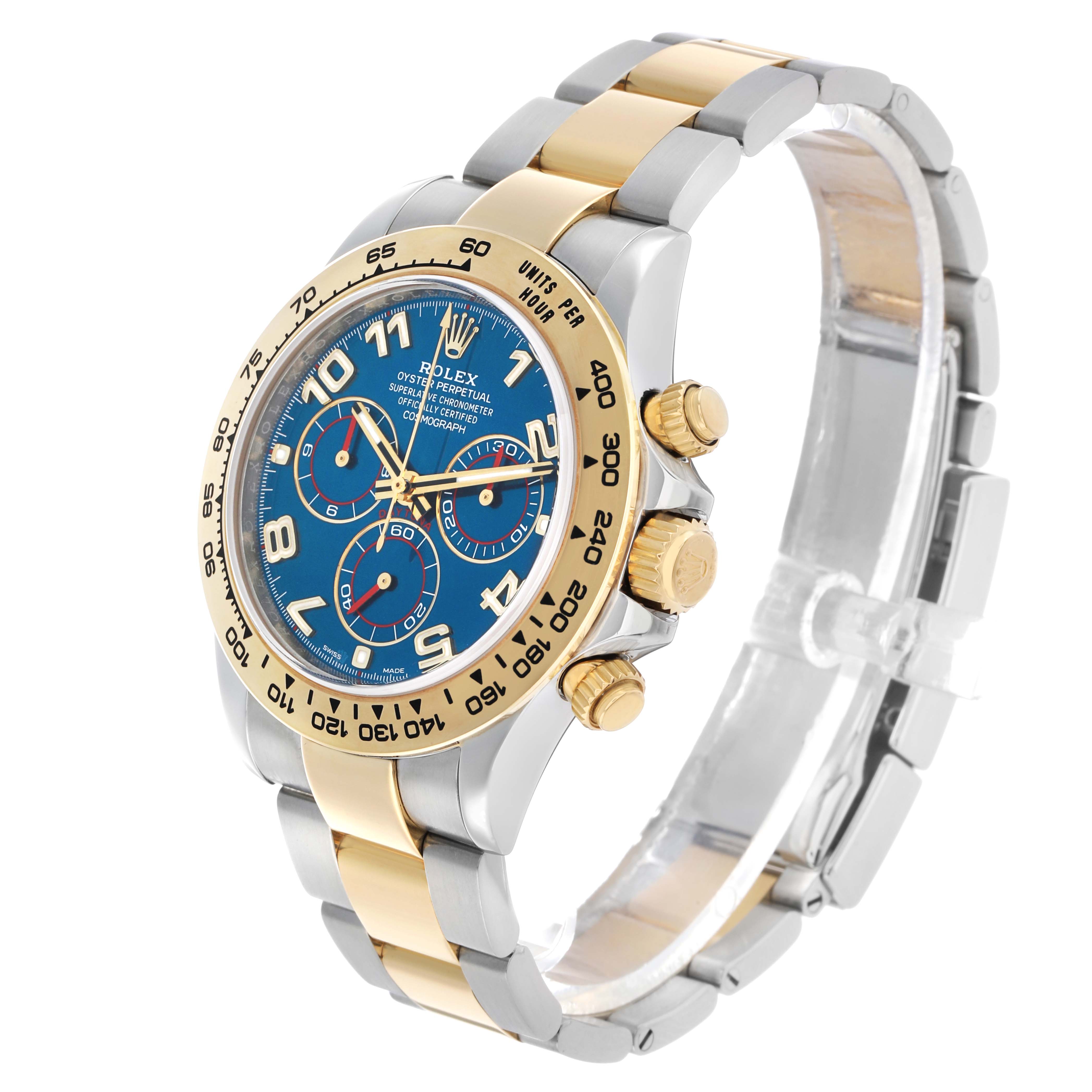 The Rolex Daytona 116503 Men's Steel and Gold (two tone) Blue Dial watch is shown at a three-quarter angle, featuring a two-tone bracelet, bezel, and three subdials on the blue face.