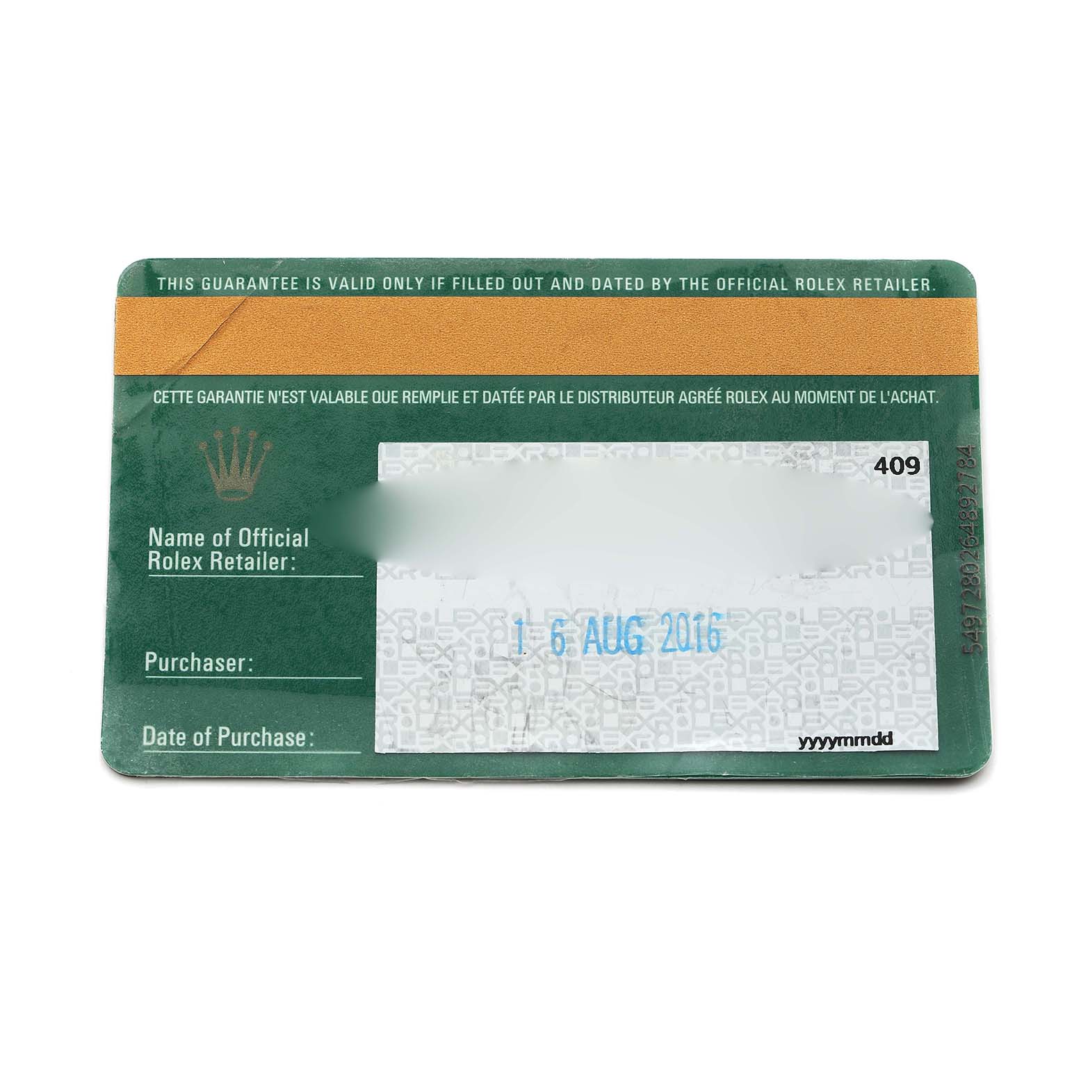 This image shows a green and gold Rolex warranty card for the Daytona model, displaying retailer and purchase information sections.