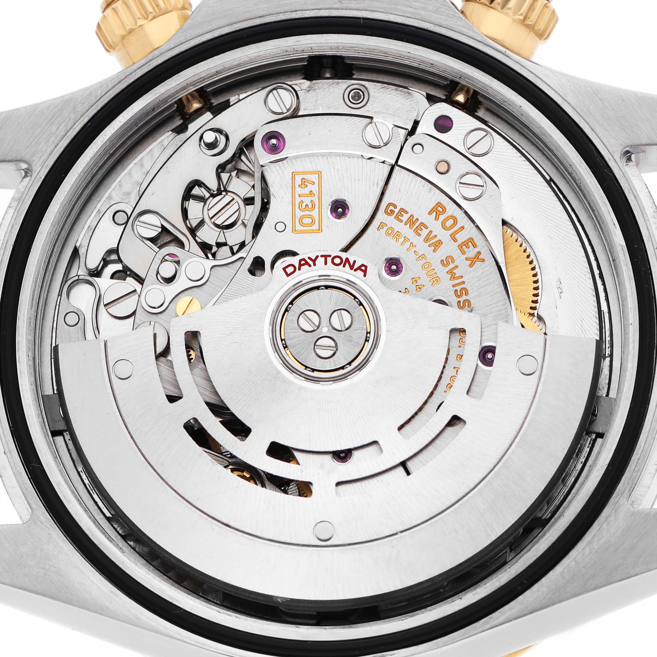 The image shows the movement mechanism of a Rolex Daytona 116503 Men's Steel and Gold (two tone) Blue Dial watch from a back angle, showcasing intricate gears and the rotor.