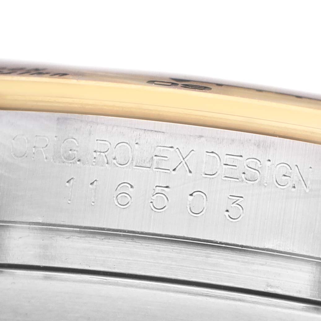 The image shows the side angle of a Rolex Daytona 116503 Men's Steel and Gold (two tone) Blue Dial watch case with an engraved model number.