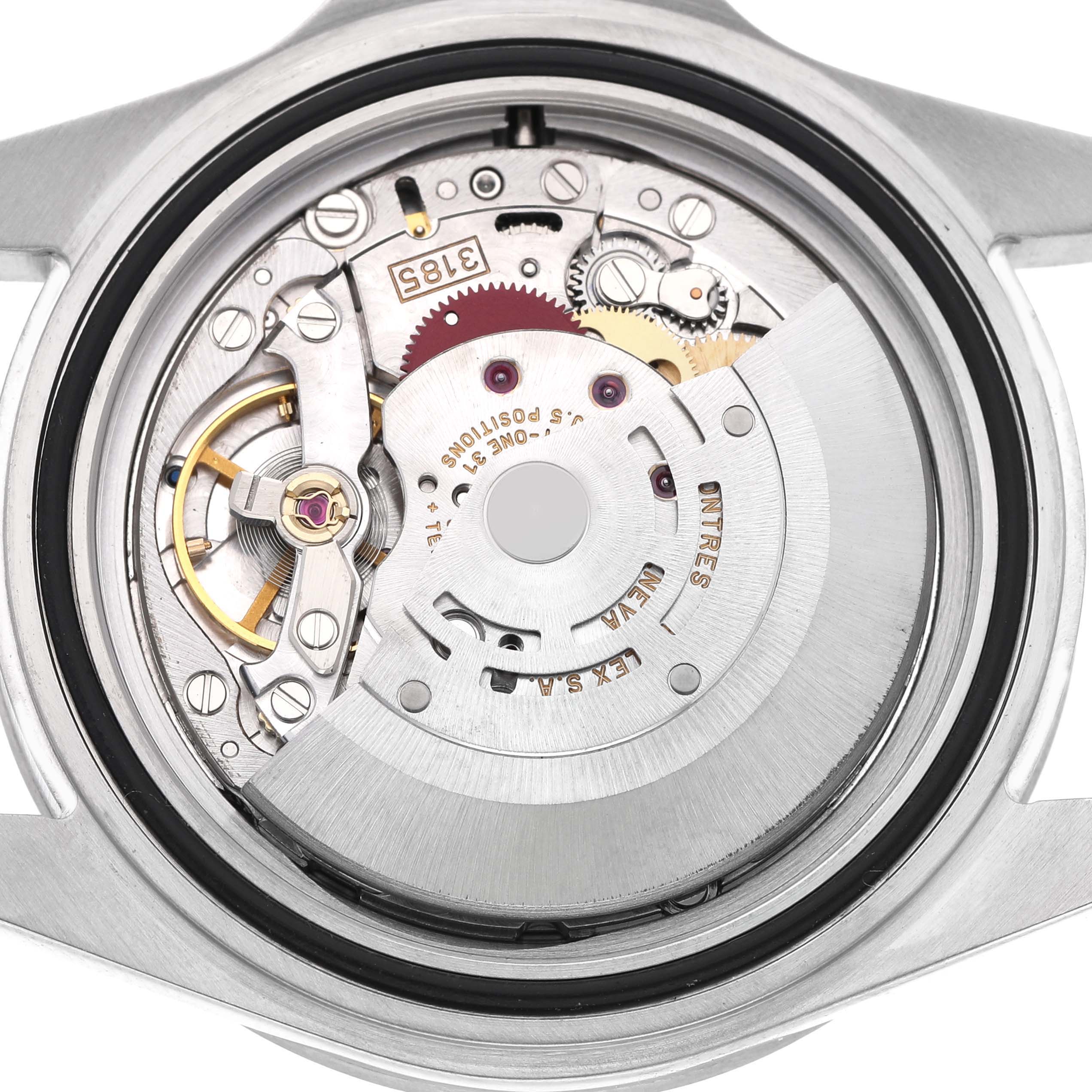 The image shows an overhead view of the Rolex Explorer 16570 Men's Stainless Steel White Dial's movement, highlighting its intricate internal components.