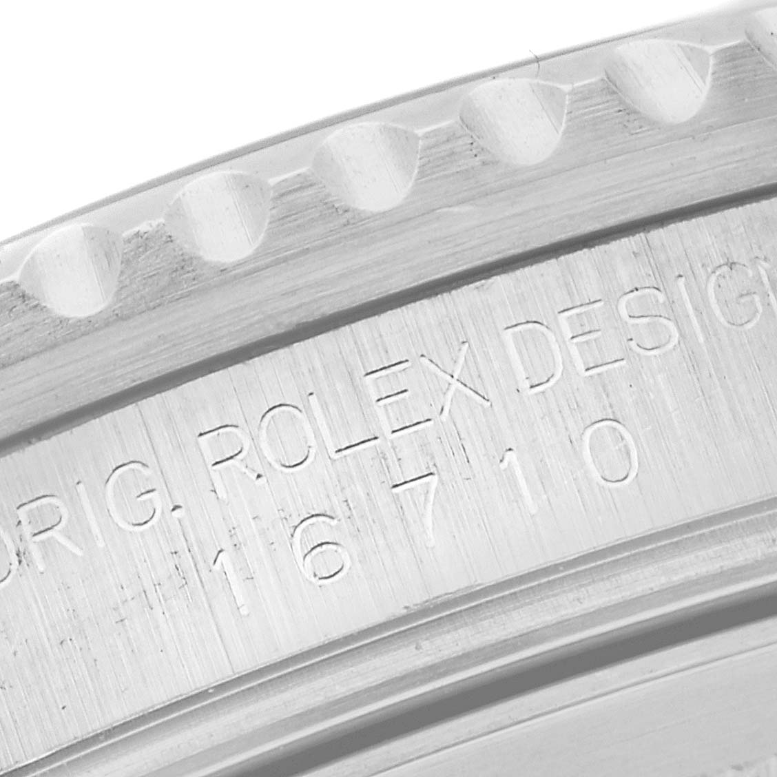 This close-up image shows the engraved model number on the case side of a Rolex GMT-Master 16710 Men
s Stainless Steel Black Dial 16710 Men
s Stainless Steel Black Dial watch.