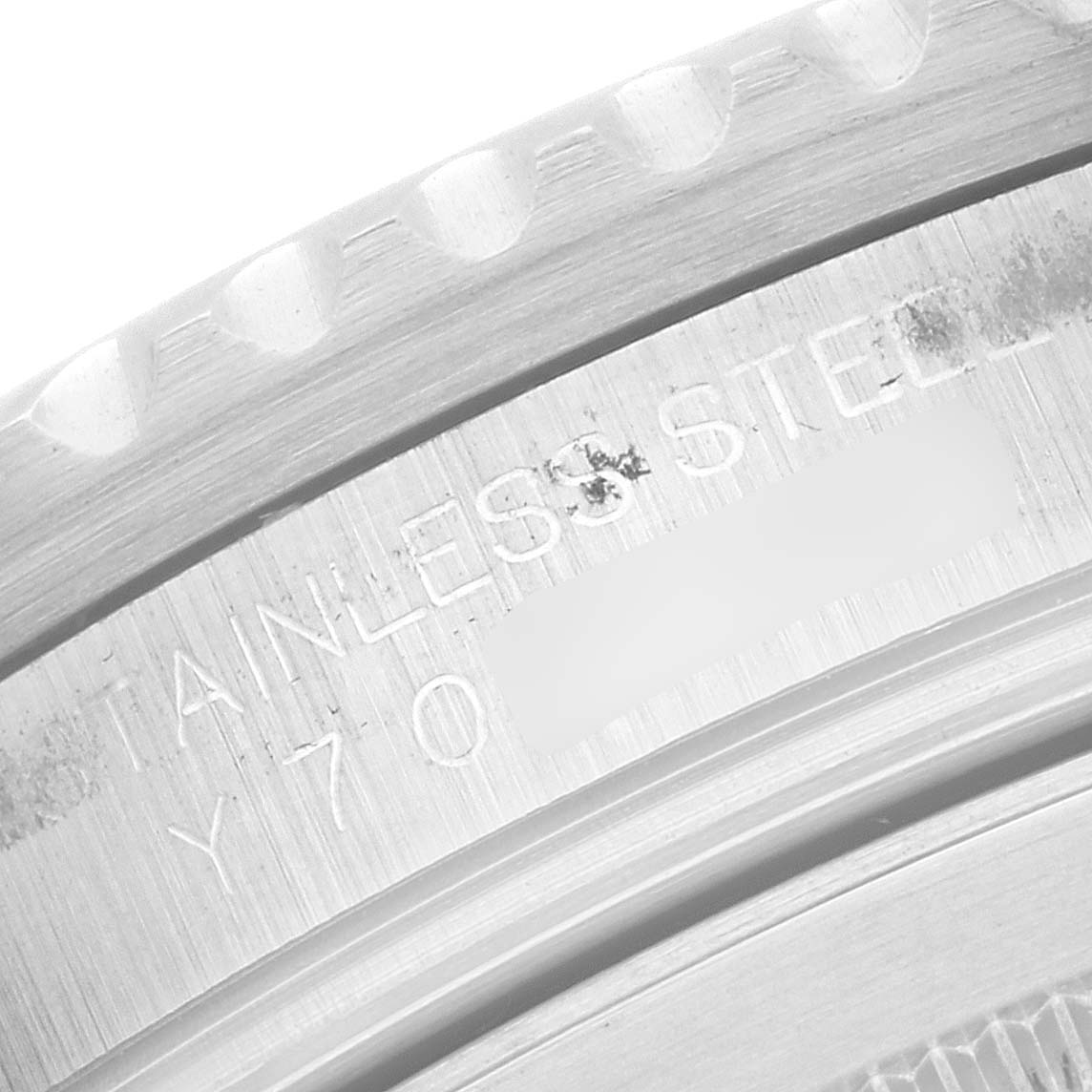 The image shows a close-up of the case back edge with engraved details of a Rolex GMT-Master 16710 Men
s Stainless Steel Black Dial 16710 Men
s Stainless Steel Black Dial watch.