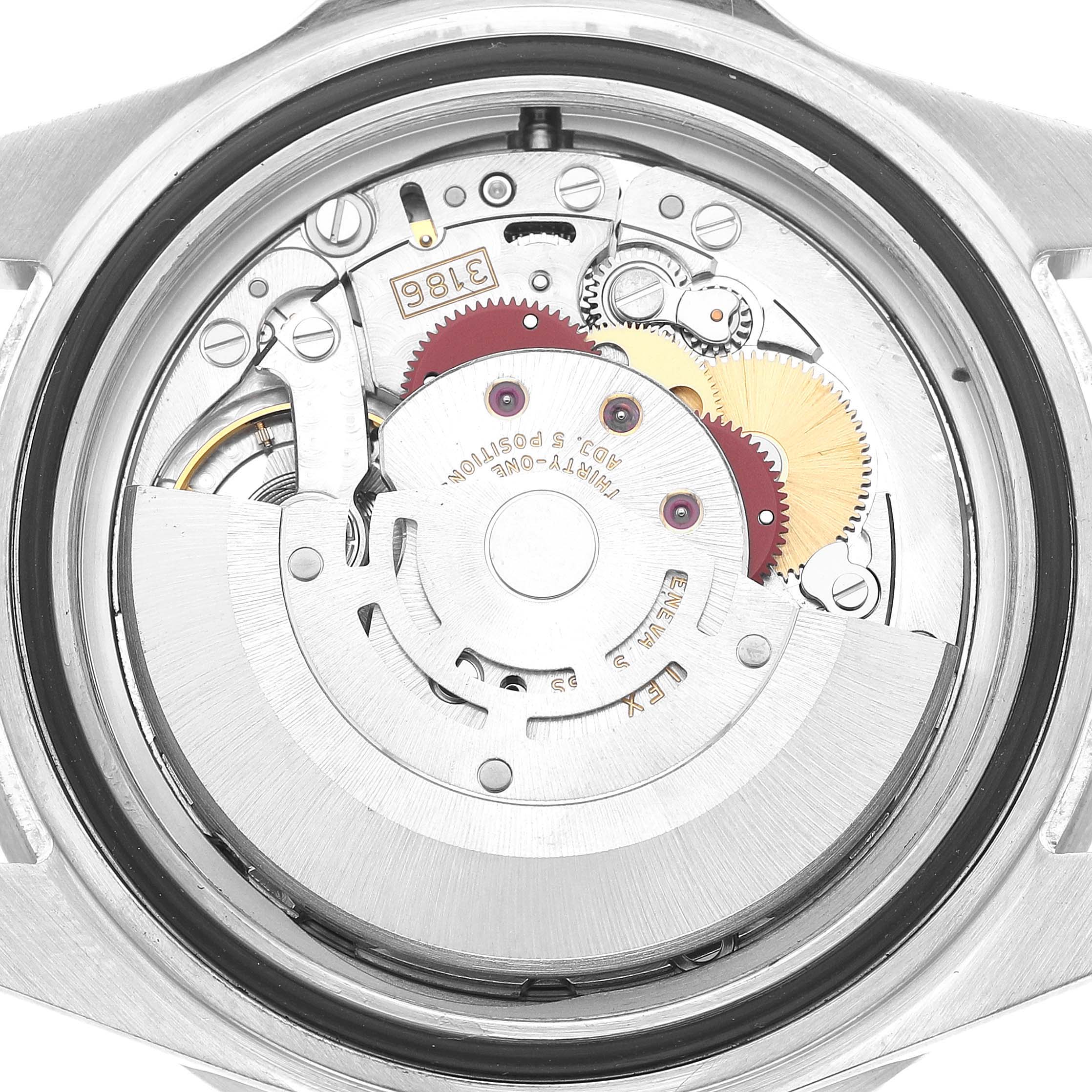 This image shows the movement of a Rolex GMT-Master 16710 Men's Stainless Steel Black Dial watch from a top-down angle, highlighting its internal gears and components.