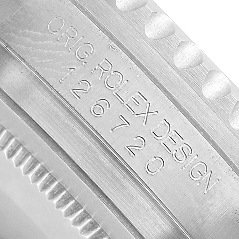 The image shows a close-up of the side of a Rolex GMT-Master 126720VTNR Men's Stainless Steel Black Dial, focusing on the engraved model number.