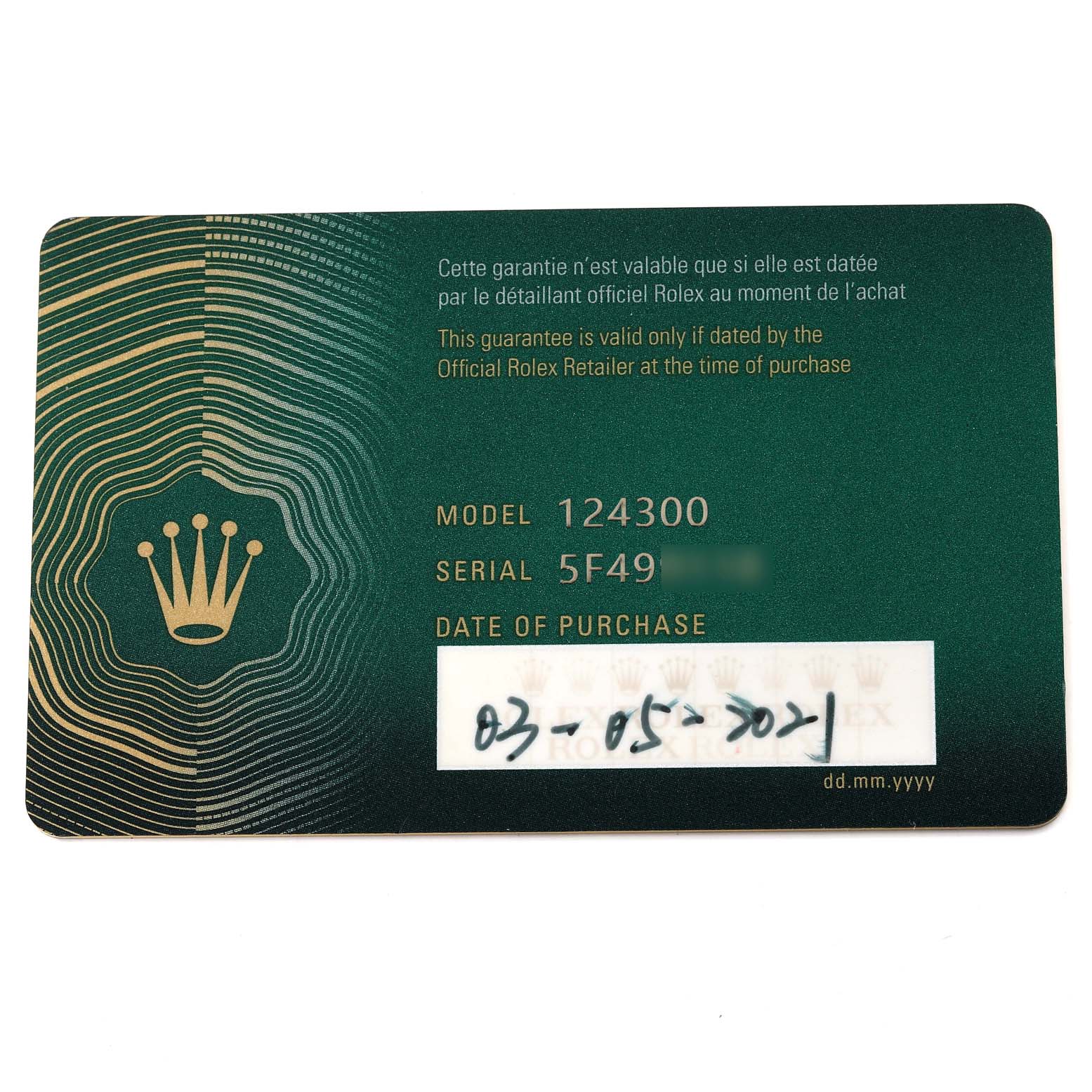 The image shows a warranty card for the Rolex Oyster Perpetual 124300 Men
s Stainless Steel Black Dial 124300 Men
s Stainless Steel Black Dial model 124300, viewed from a top-down angle.