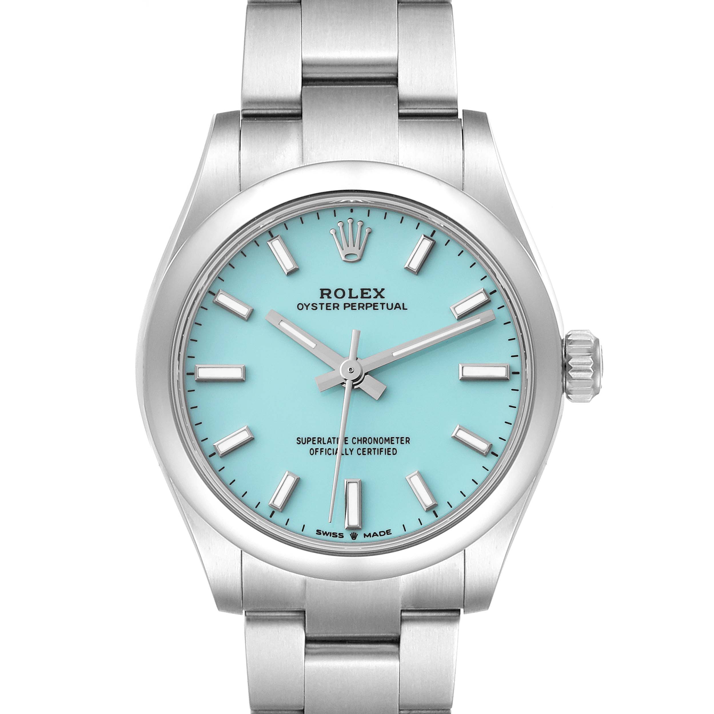The image shows a front view of a Mid-Size Rolex Oyster Perpetual watch with a turquoise dial and silver bracelet.