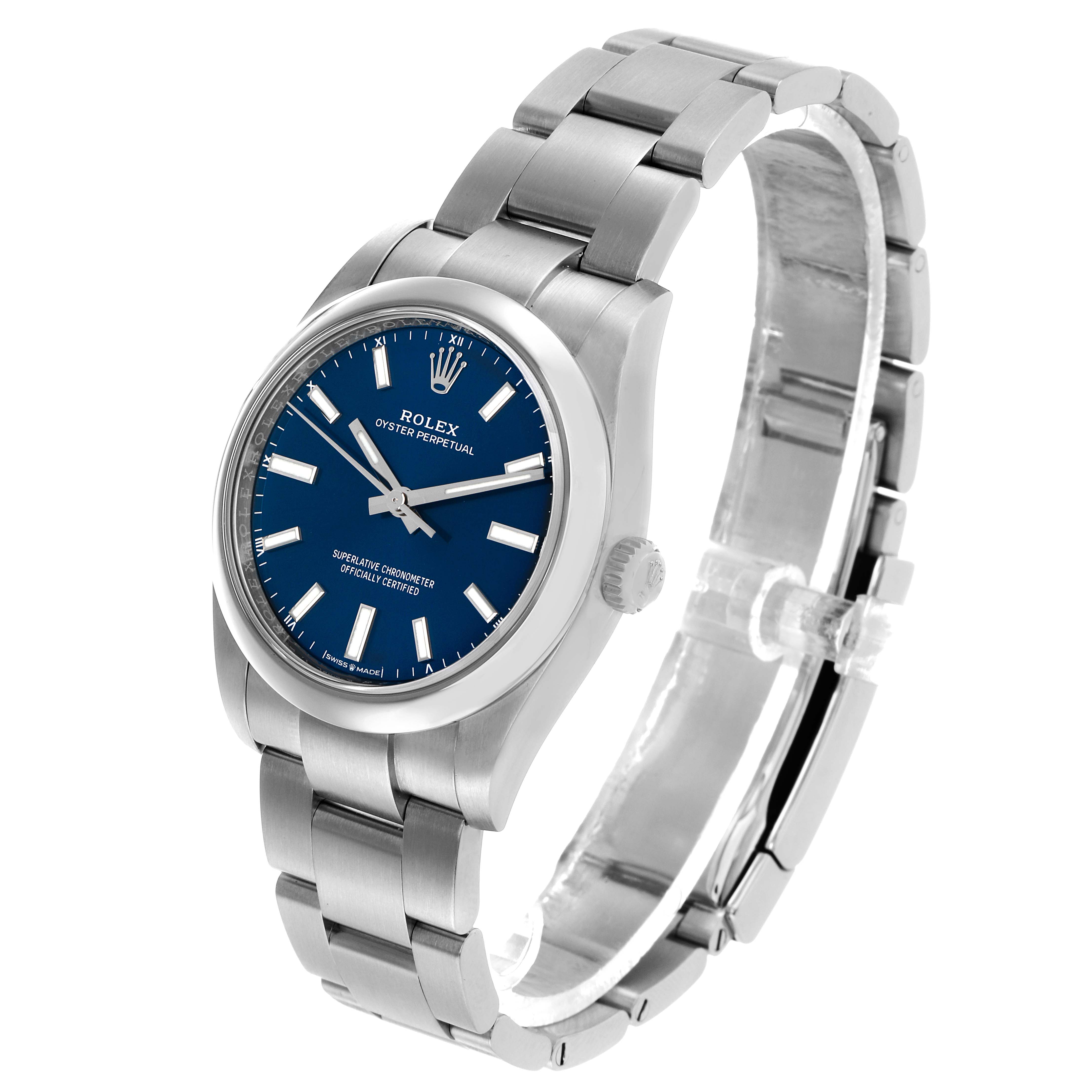 The Rolex Oyster Perpetual 124200 Men's Stainless Steel Blue Dial watch is shown at a three-quarter angle, highlighting the blue dial, bezel, and bracelet.