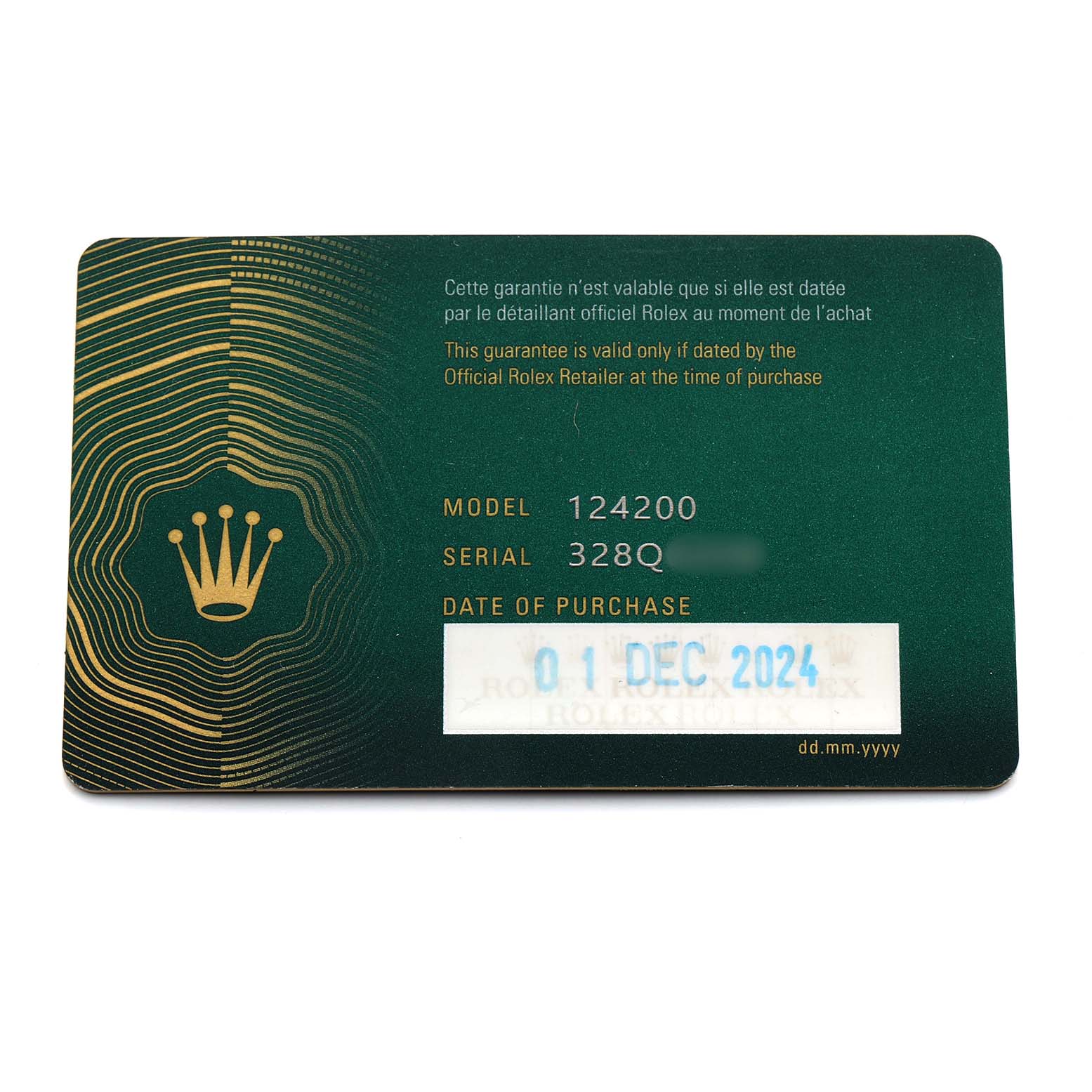 The image shows a Rolex warranty card for the Oyster Perpetual model, displaying model, serial number, and purchase date.