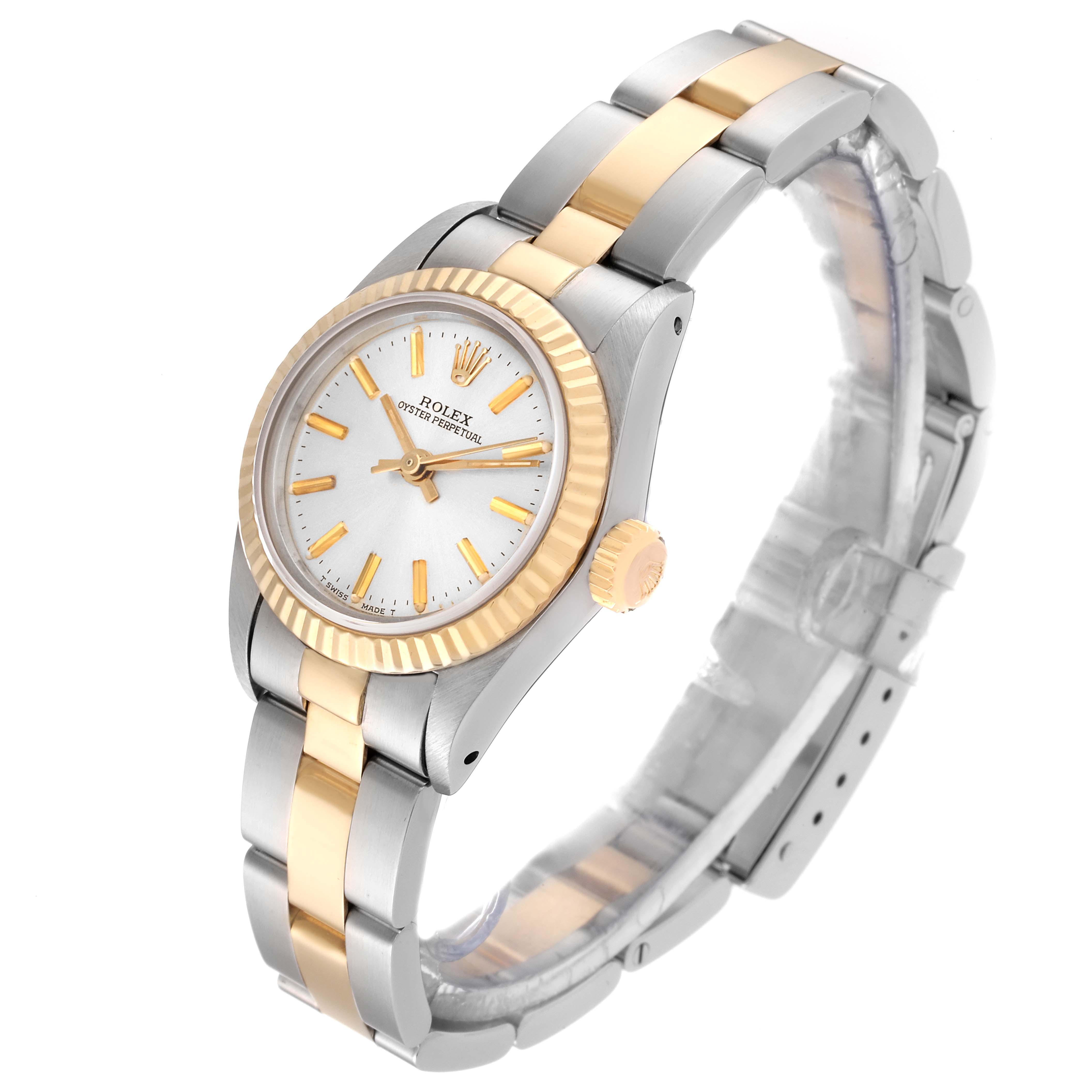 This image shows a Rolex Oyster Perpetual 67193 Women's Steel and Gold (two tone) Silver Dial 67193 Women's Steel and Gold (two tone) Silver Dial watch at a three-quarter angle, highlighting the dial, crown, and two-tone bracelet.