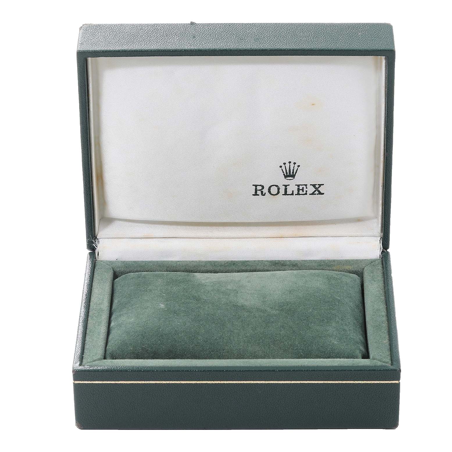 This image shows an open green Rolex box, presumably for an Oyster Perpetual model watch, with a velvet cushion inside.