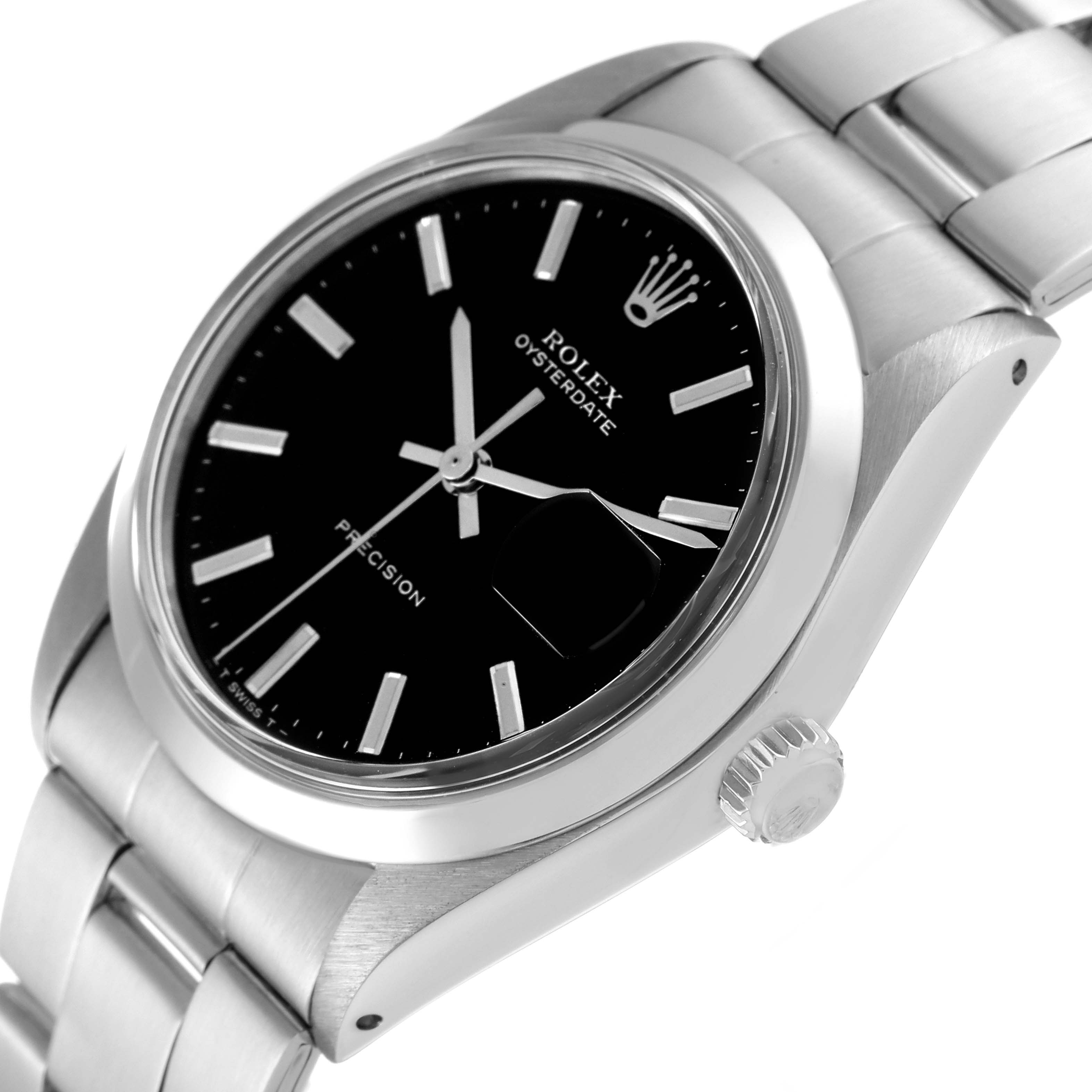 The image shows a side angle of the Rolex Vintage Collection 6694 Men's Stainless Steel Black Dial 6694 Men's Stainless Steel Black Dial Oysterdate watch, highlighting its black dial, silver case, and bracelet.