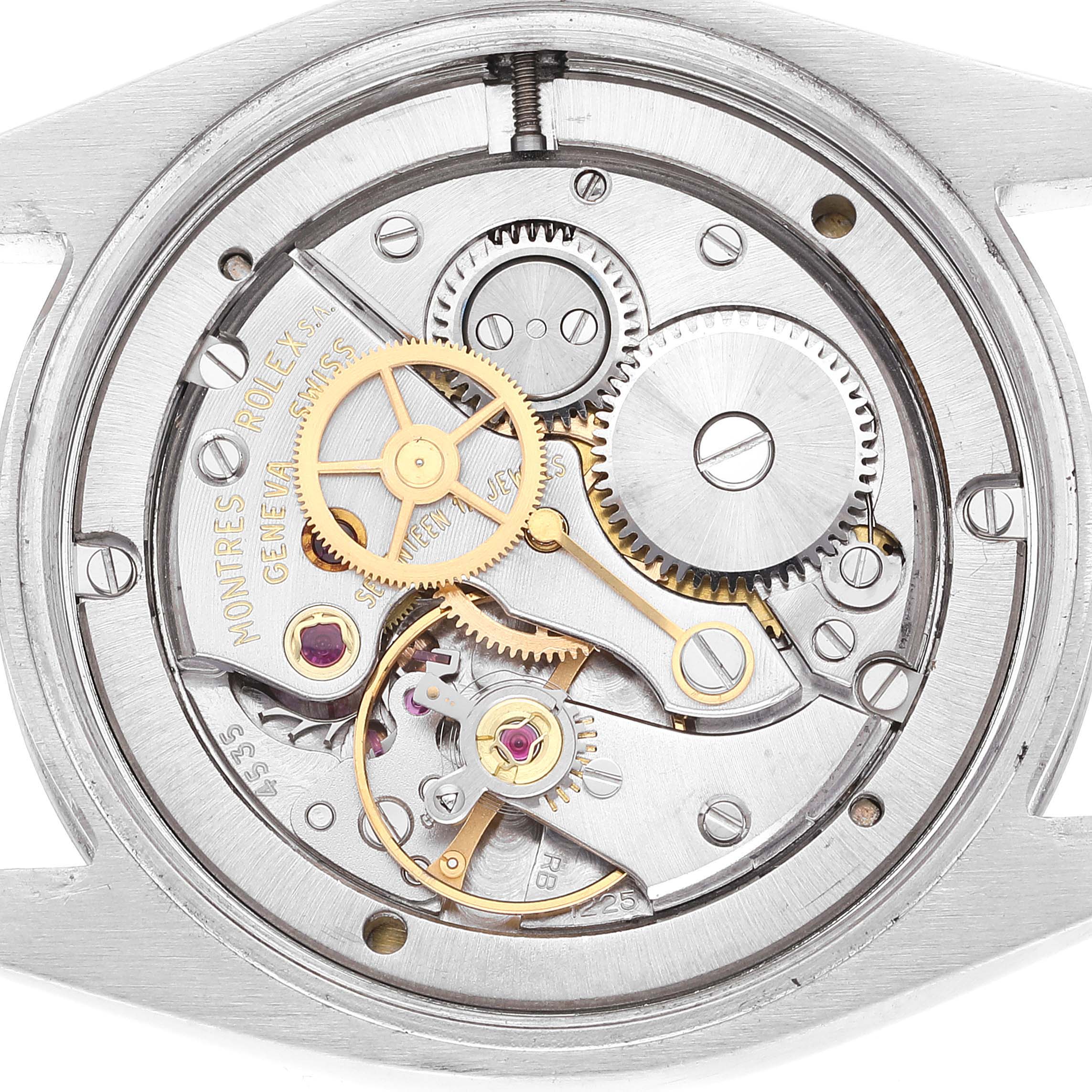 This image shows the internal mechanism of a Vintage Collection Rolex watch, viewed from the back.