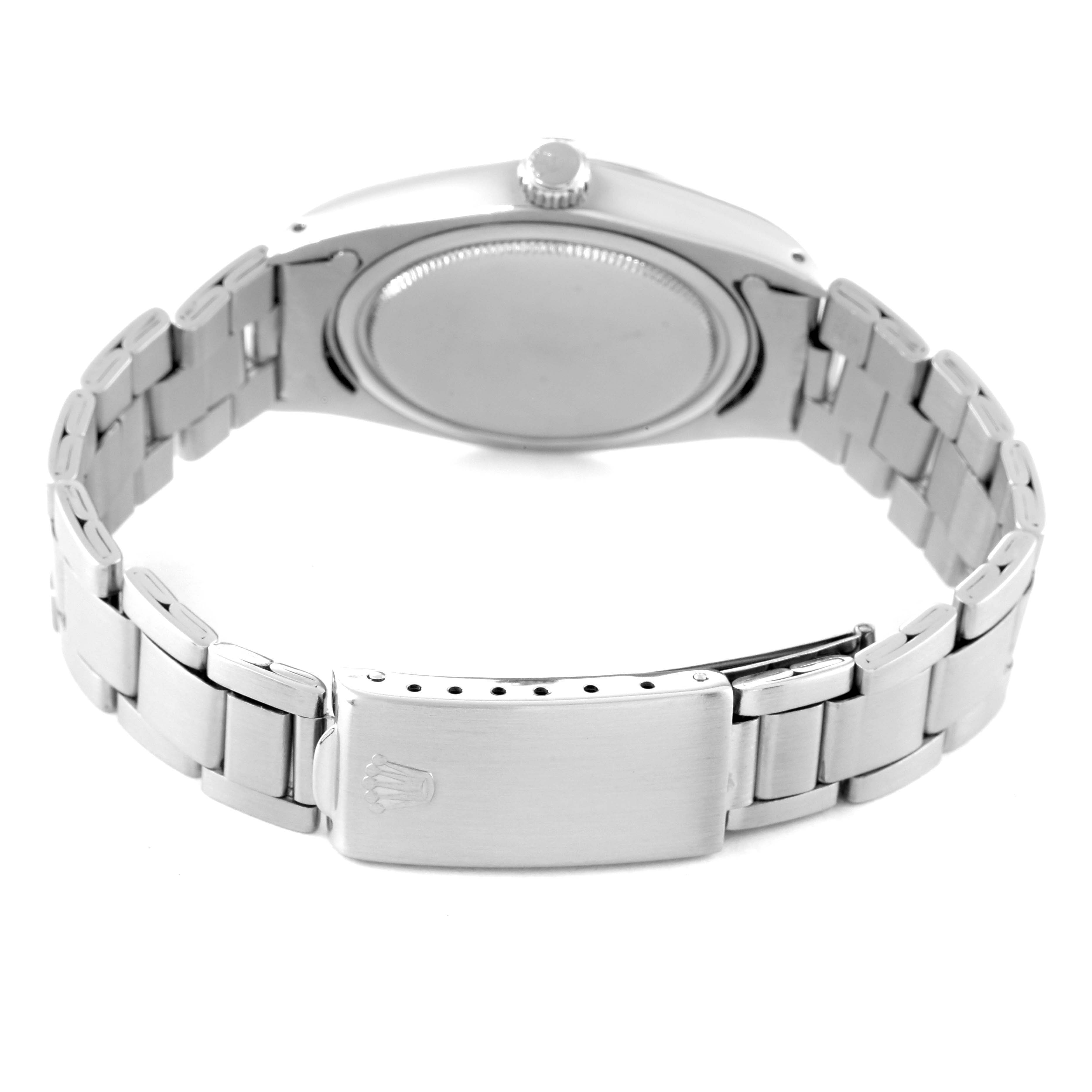 The image shows the back and bracelet of the Rolex Vintage Collection 6694 Men's Stainless Steel Black Dial 6694 Men's Stainless Steel Black Dial watch, highlighting the clasp and case back.