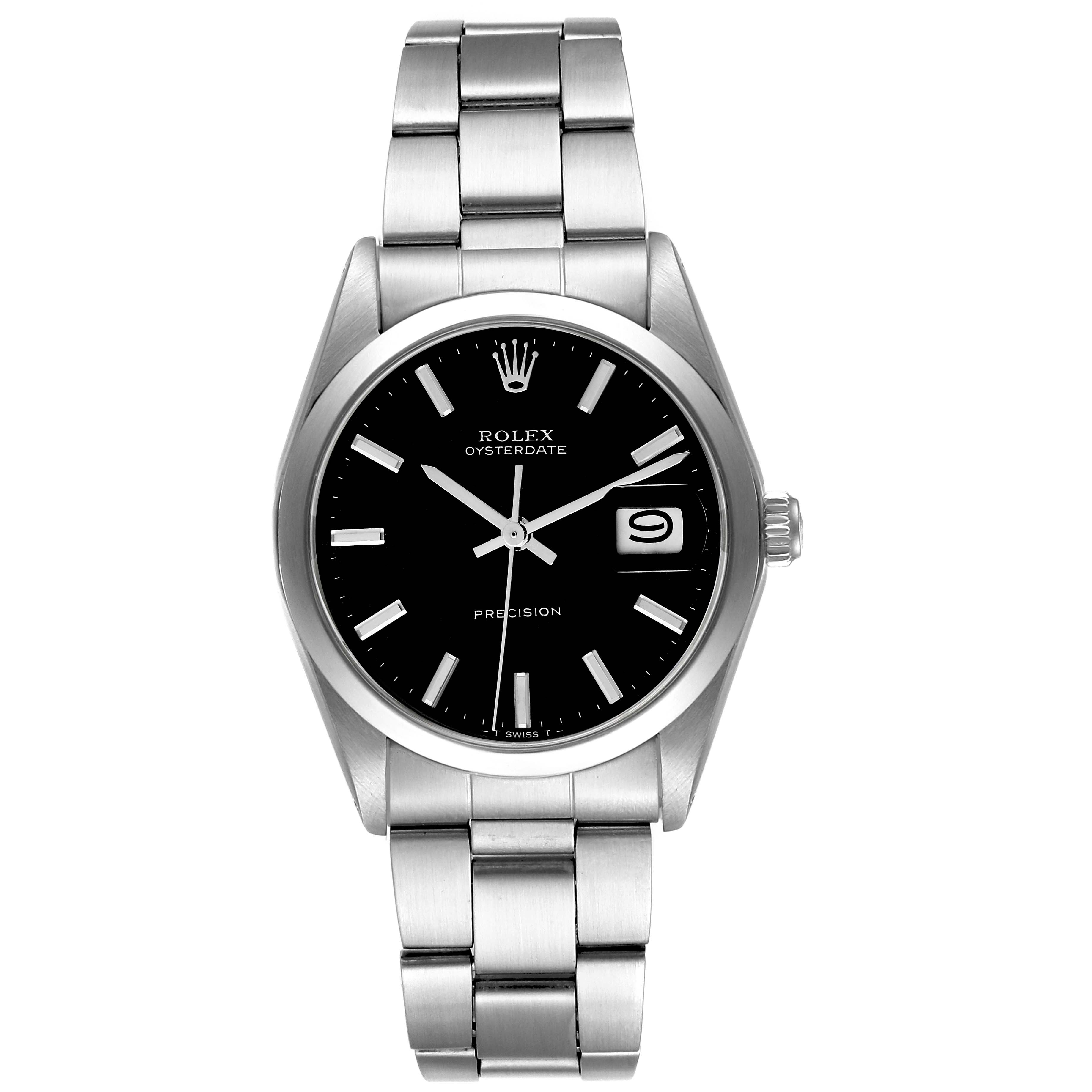 The image shows a frontal view of a Rolex Vintage Collection 6694 Men's Stainless Steel Black Dial 6694 Men's Stainless Steel Black Dial watch, showcasing its face, dial, and stainless steel band.