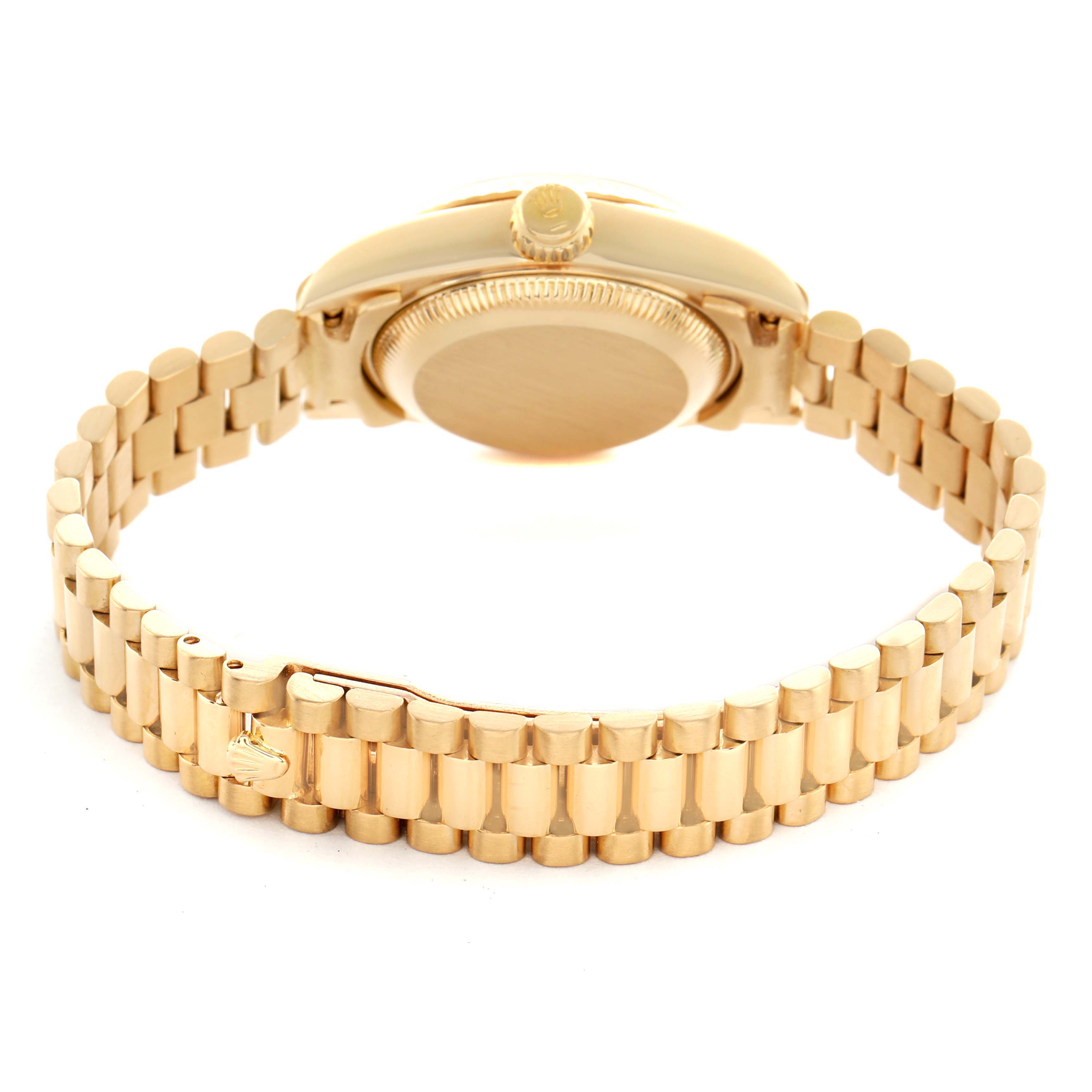 The image shows the backside of a Rolex President 69178 Women's Yellow Gold Champagne Dial model watch, highlighting the bracelet and case back.