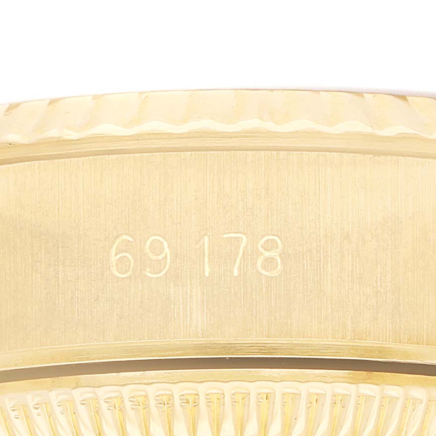 The image shows a close-up side view of a Rolex President 69178 Women's Yellow Gold Champagne Dial model, focusing on the case with engraved numbers.