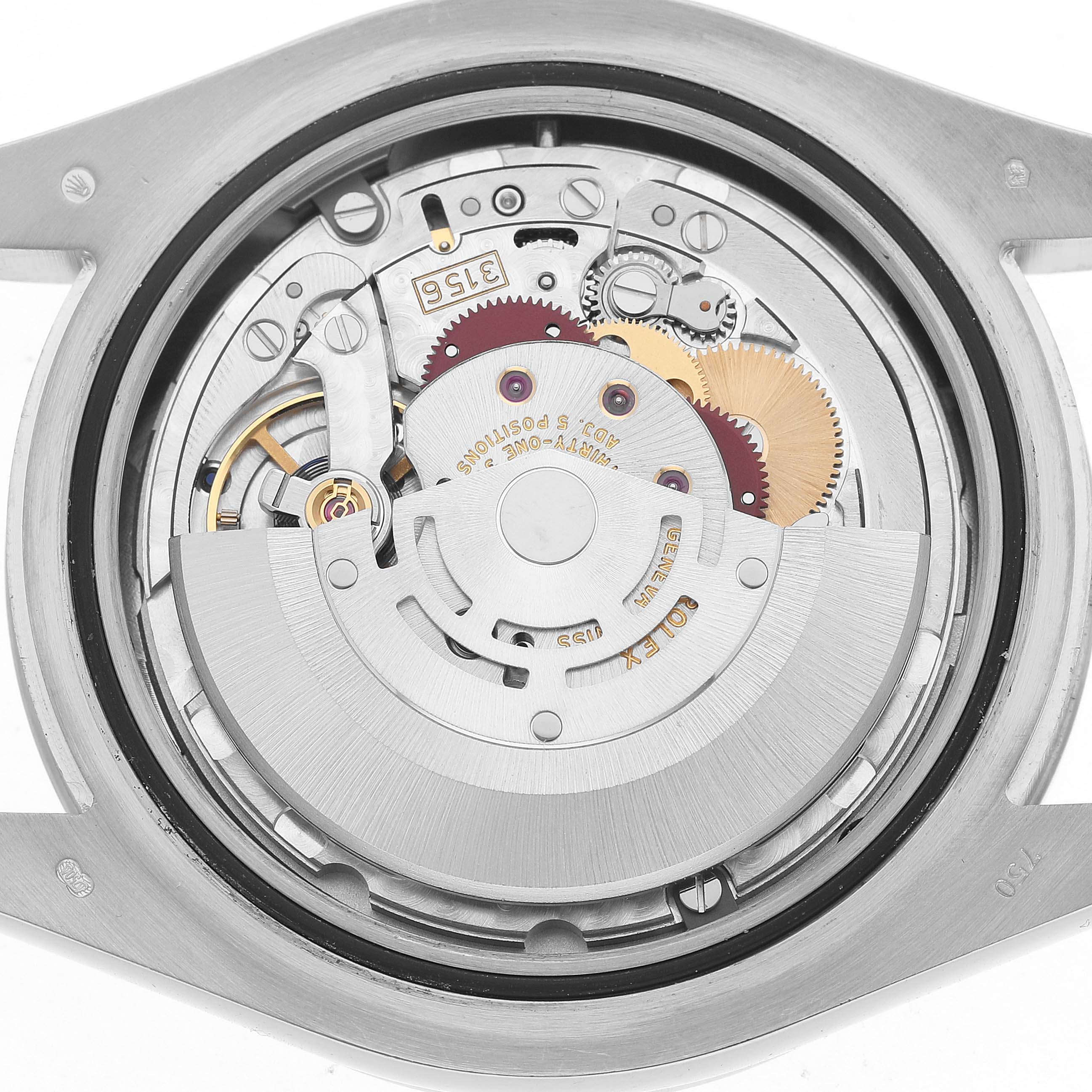 The image shows the movement of a Rolex President 218349 Men's White Gold White Dial watch from a top-down angle, revealing gears and the rotor.