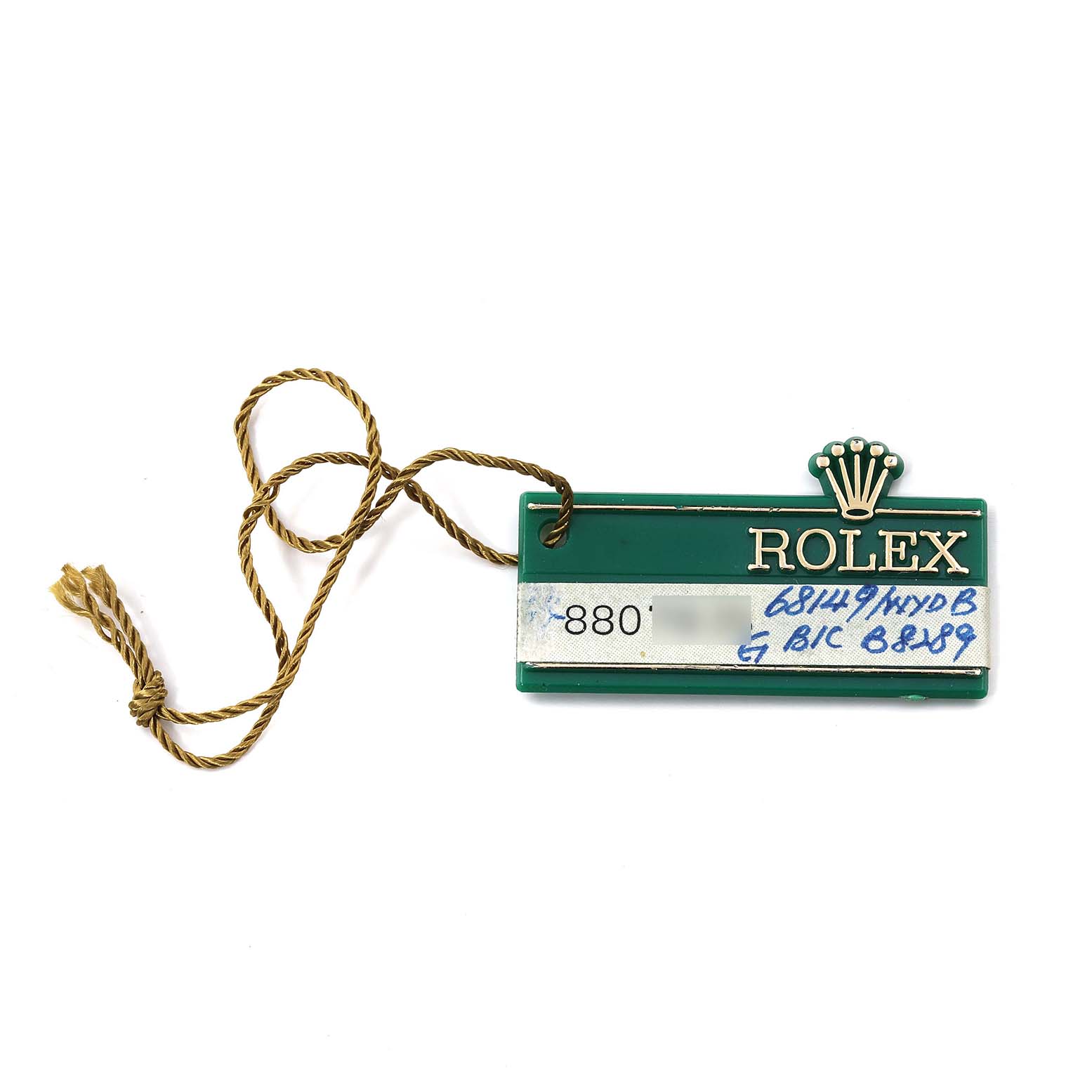 This image shows the green hang tag of a Rolex President 68149 Women's White Gold Champagne Dial 68149 Women's White Gold Champagne Dial model watch, including its brand name and logo.