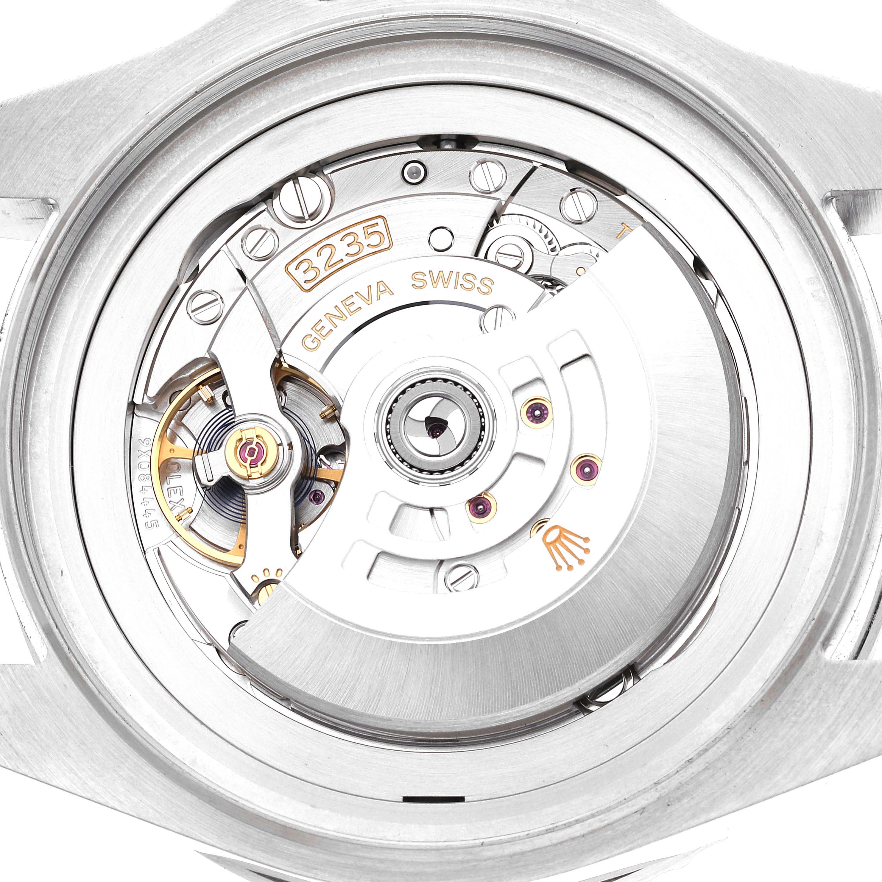 This image shows a close-up of the movement and internal mechanism of a Rolex Sea-Dweller 126660 Men
s Stainless Steel Black Dial 126660 Men
s Stainless Steel Black Dial watch, specifically focusing on the rotor and balance wheel.