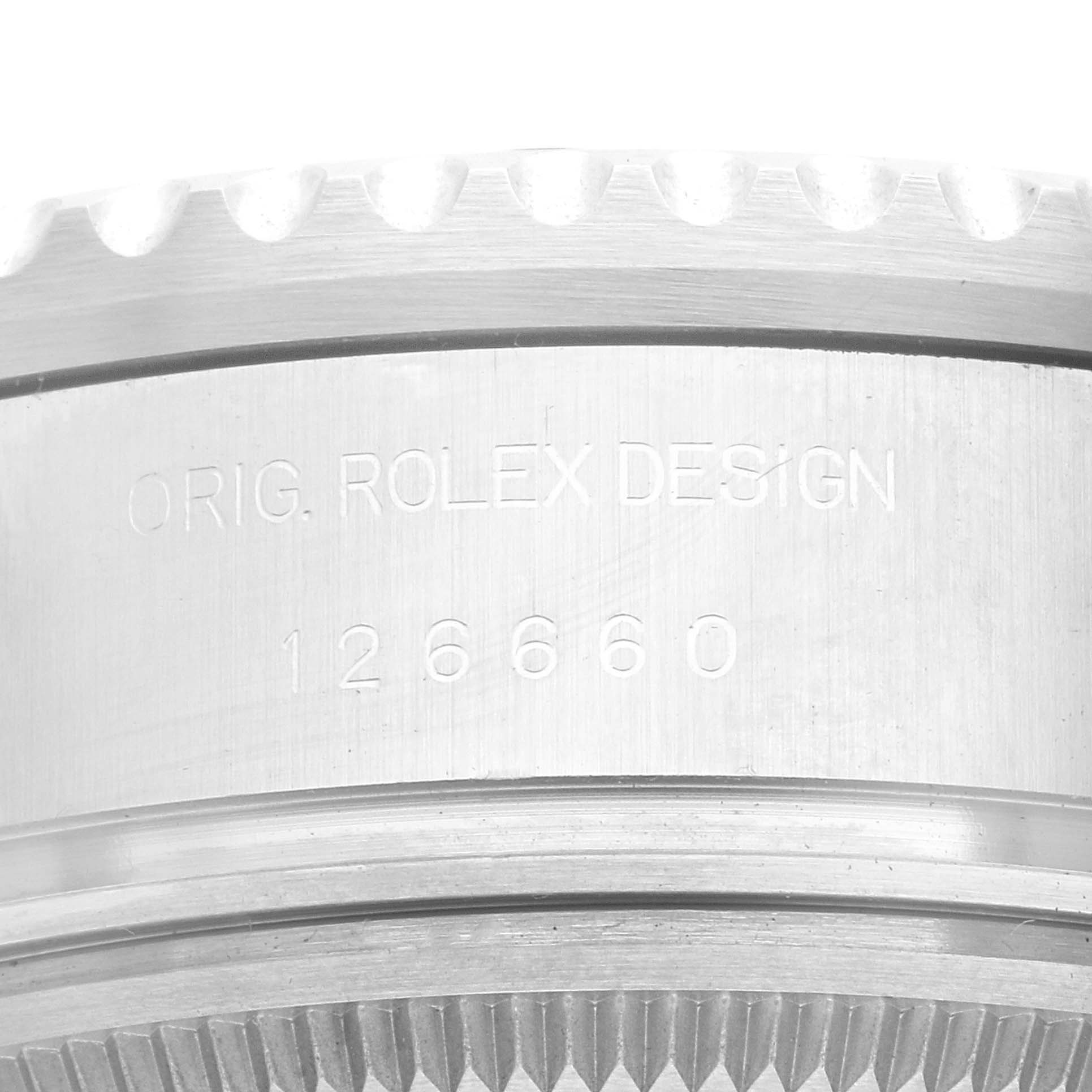 This image shows a close-up of the case side of a Rolex Sea-Dweller 126660 Men
s Stainless Steel Black Dial 126660 Men
s Stainless Steel Black Dial, featuring the model number 126660 and "ORIG. ROLEX DESIGN" inscription.