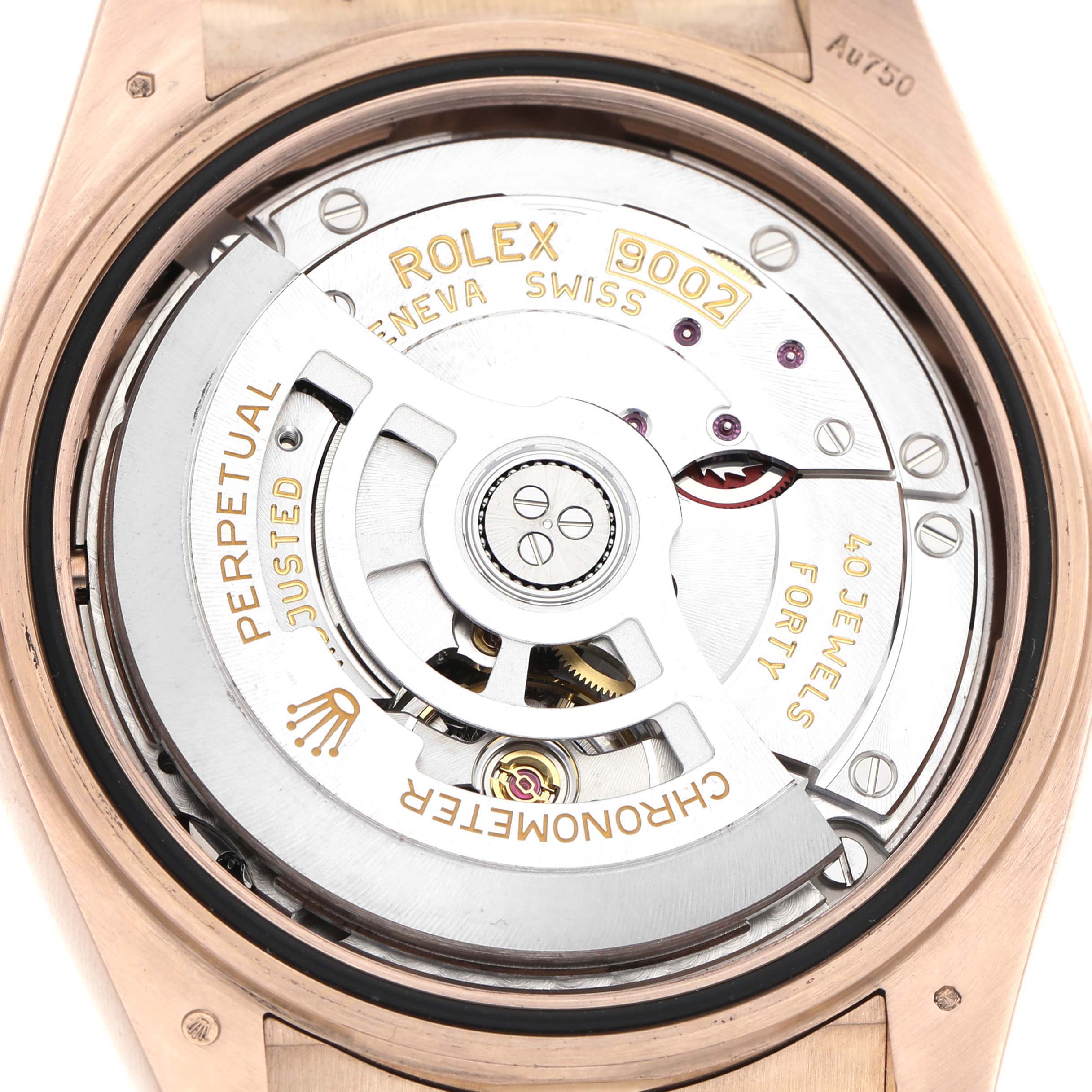The image shows the movement of a Rolex Sky-Dweller 336235 Men's Rose Gold Brown Dial watch, displaying the intricate mechanics and internal components from the back.