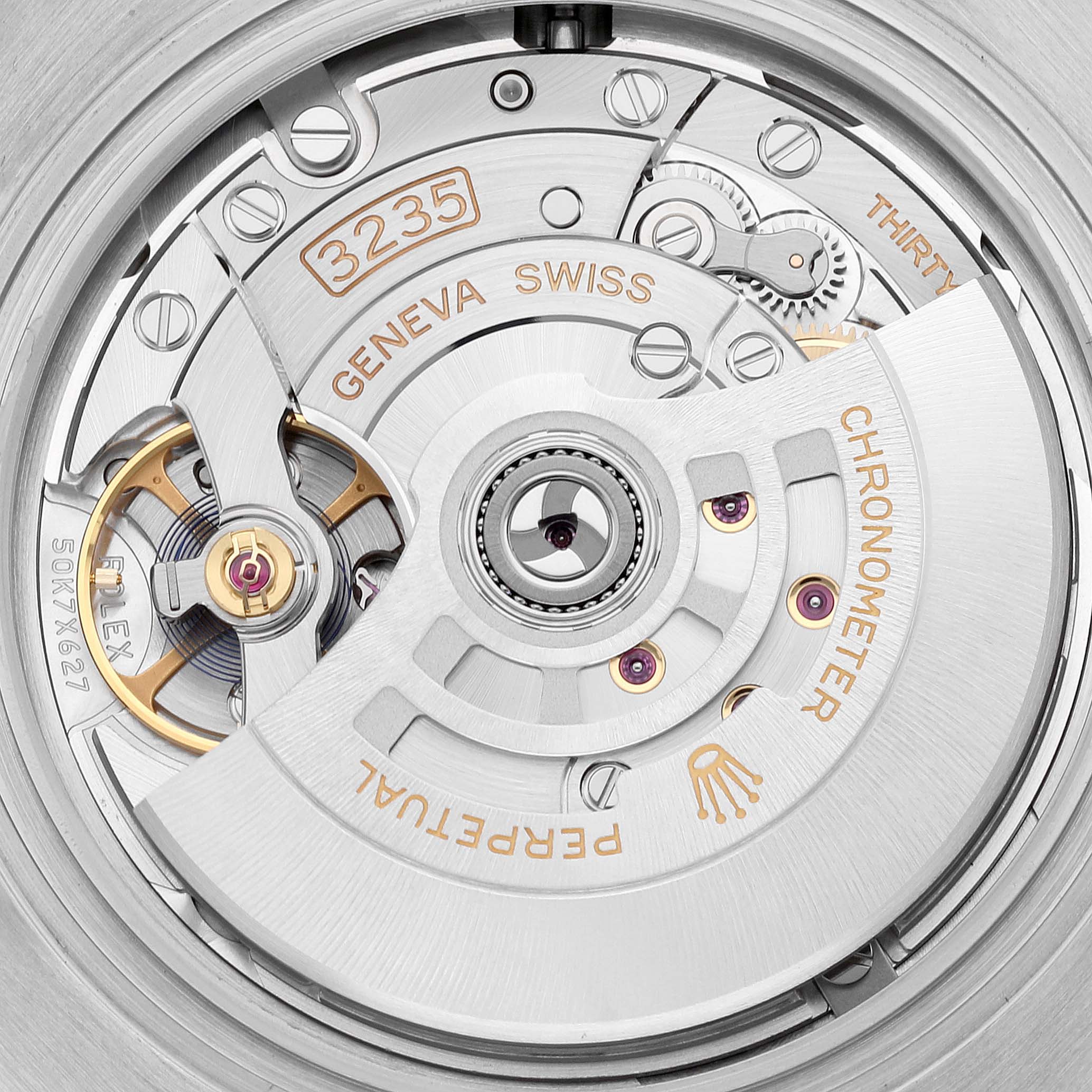 This angled shot shows the movement of a Rolex Submariner 126613LB Men
s Steel and Gold (two tone) Blue Dial 126613LB Men
s Steel and Gold (two tone) Blue Dial, highlighting its intricate internal mechanics.