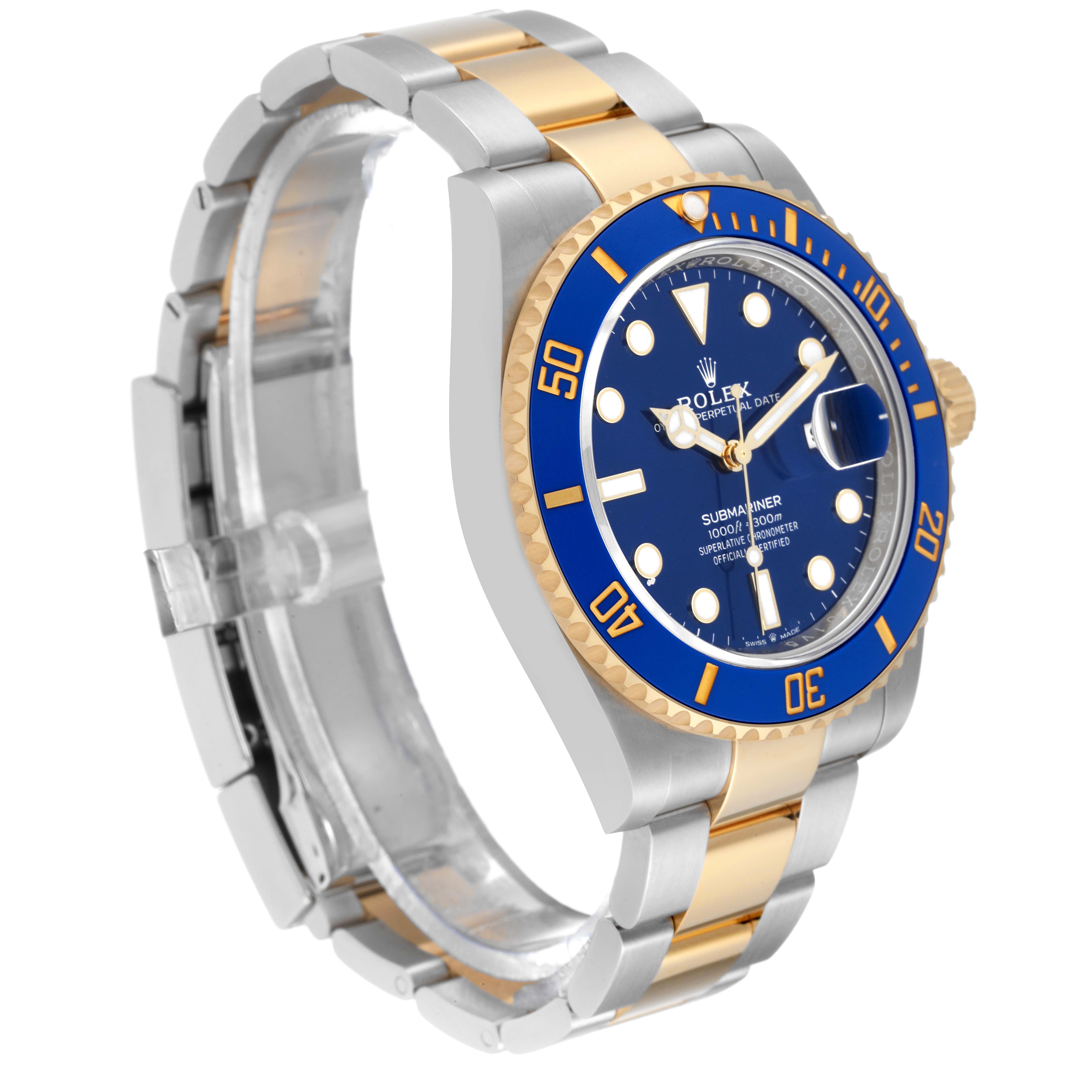 The image shows a side angle of a Rolex Submariner 126613LB Men
s Steel and Gold (two tone) Blue Dial 126613LB Men
s Steel and Gold (two tone) Blue Dial watch, highlighting the blue dial, blue bezel, and two-tone bracelet.