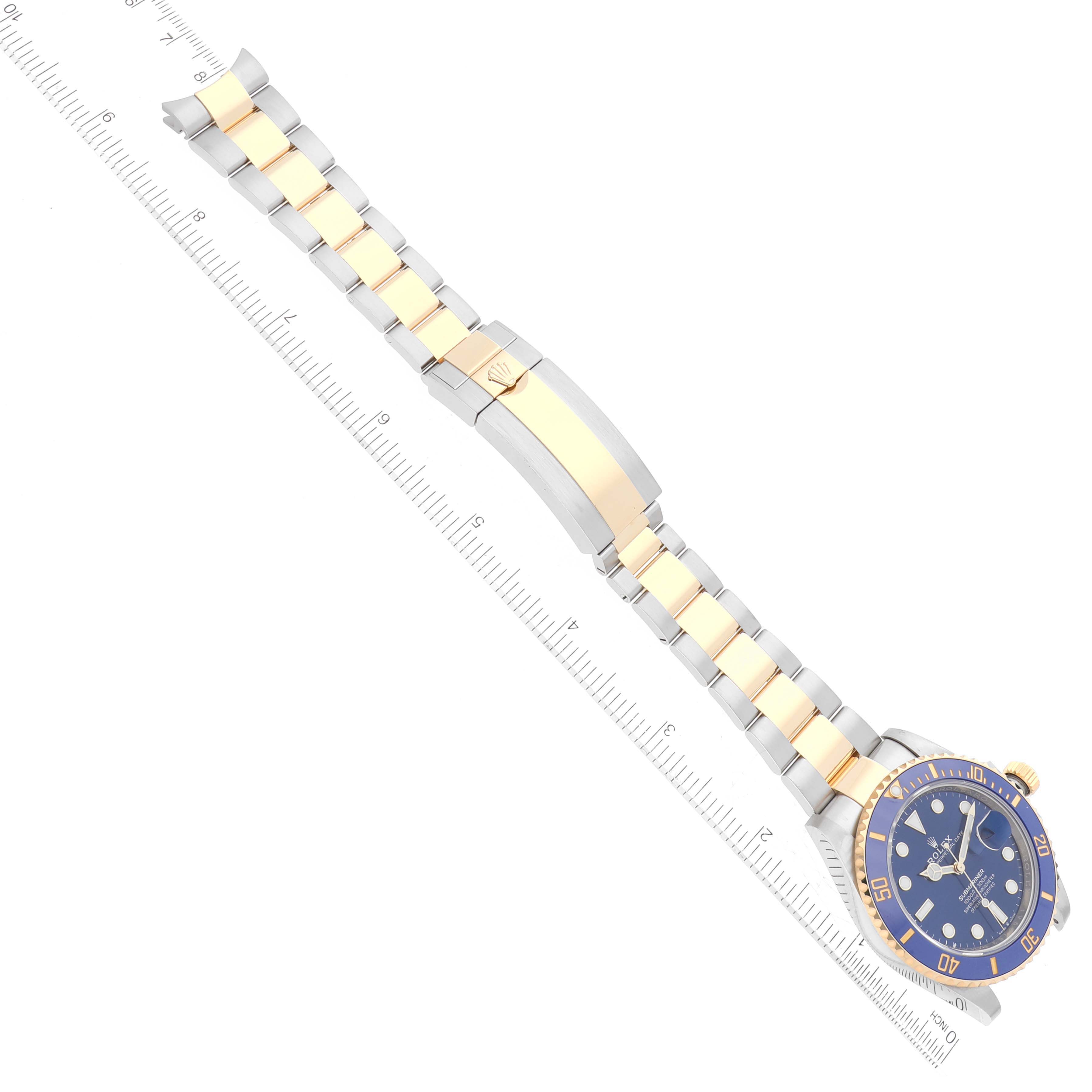 This image shows a top-down view of the Rolex Submariner 126613LB Men
s Steel and Gold (two tone) Blue Dial 126613LB Men
s Steel and Gold (two tone) Blue Dial watch, with emphasis on the blue dial, bezel, and two-tone metal bracelet.