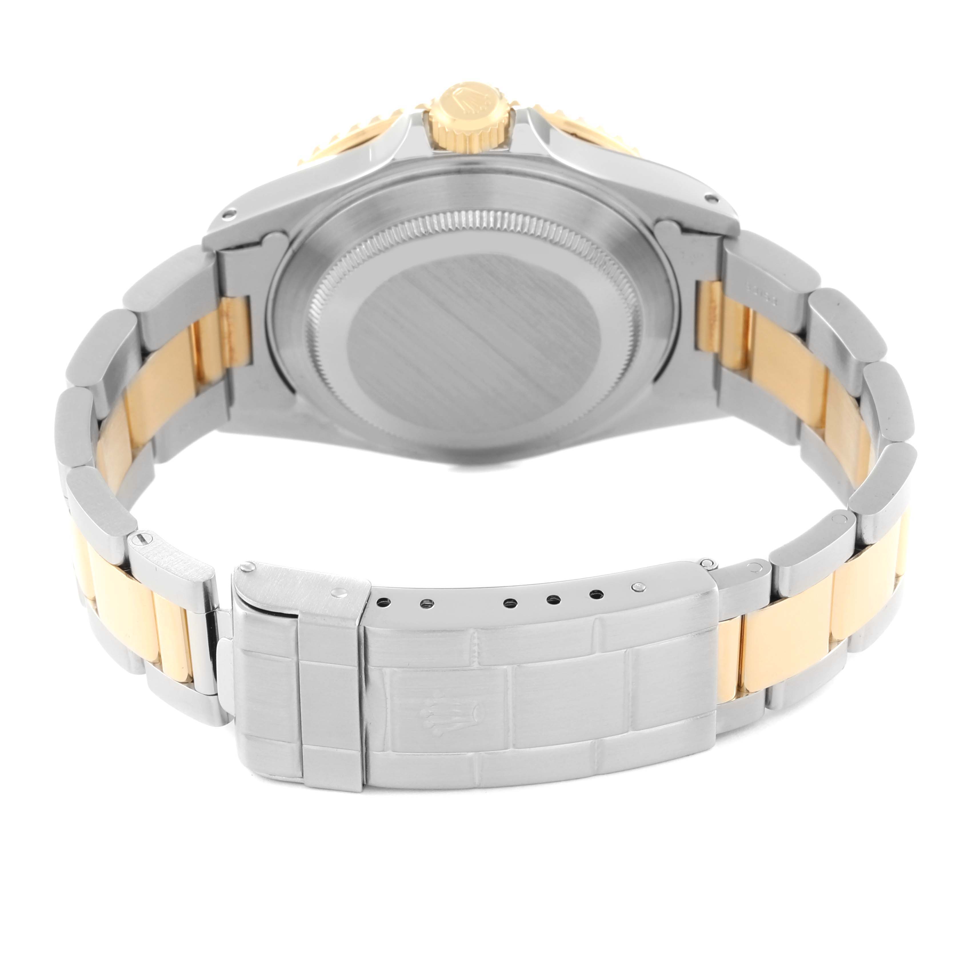 The image shows the back case, crown, and bracelet clasp of a Rolex Submariner 16613 Men
s Steel and Gold (two tone) Blue Dial 16613 Men
s Steel and Gold (two tone) Blue Dial watch, viewed from the rear.