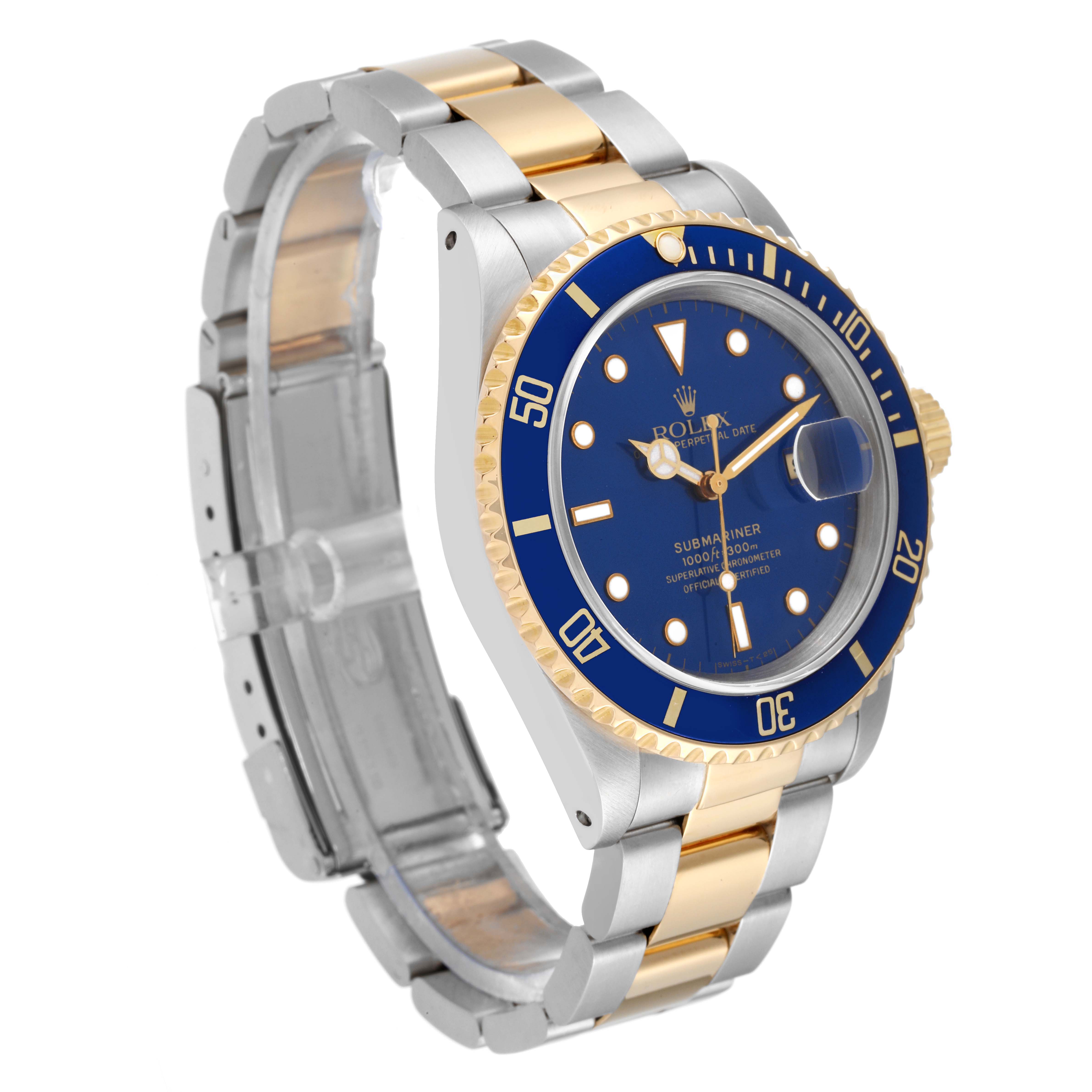 The Rolex Submariner 16613 Men
s Steel and Gold (two tone) Blue Dial 16613 Men
s Steel and Gold (two tone) Blue Dial watch is shown at a front-left angle, displaying the blue dial, bezel, and two-tone bracelet.